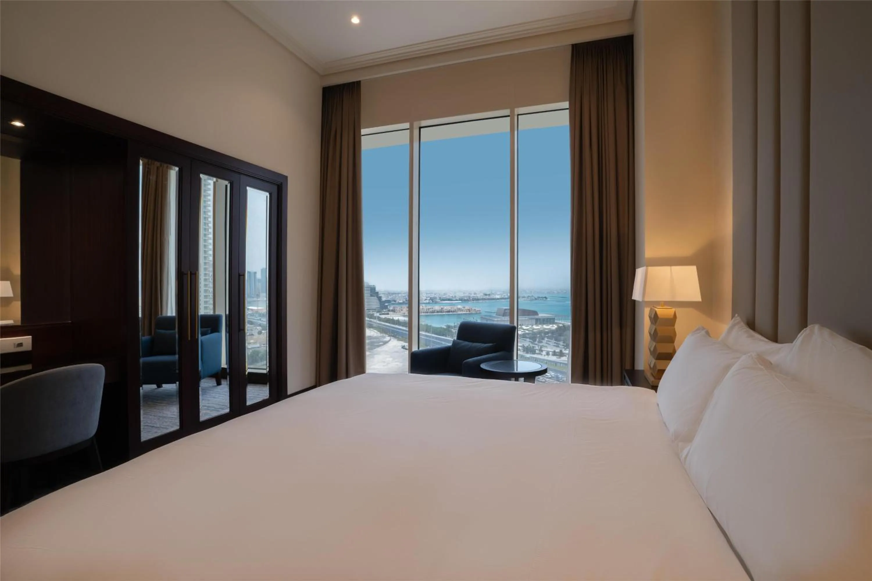 Photo of the whole room, Bed in The Diplomat Radisson Blu Hotel Residence & Spa