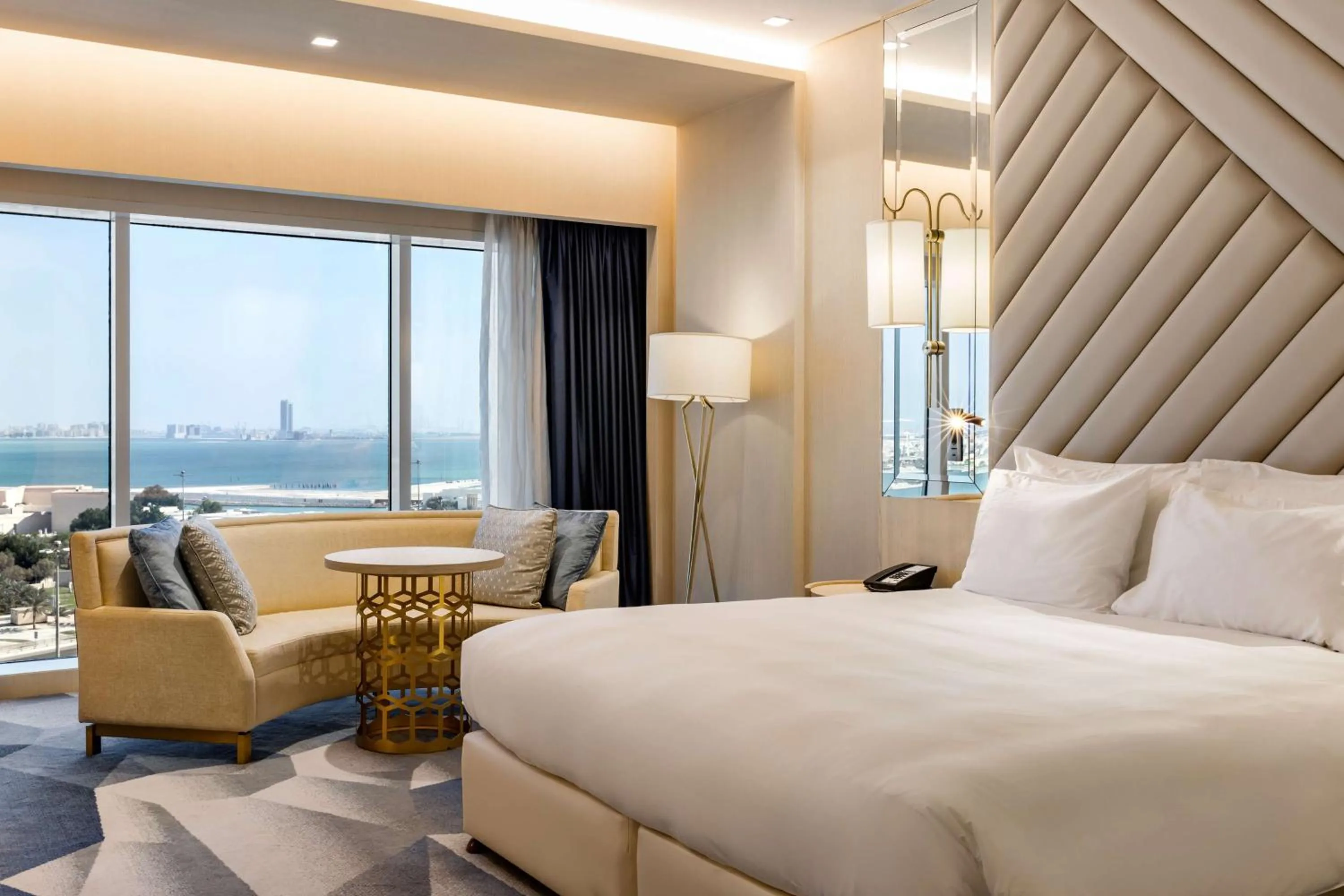 Bed in The Diplomat Radisson Blu Hotel Residence & Spa