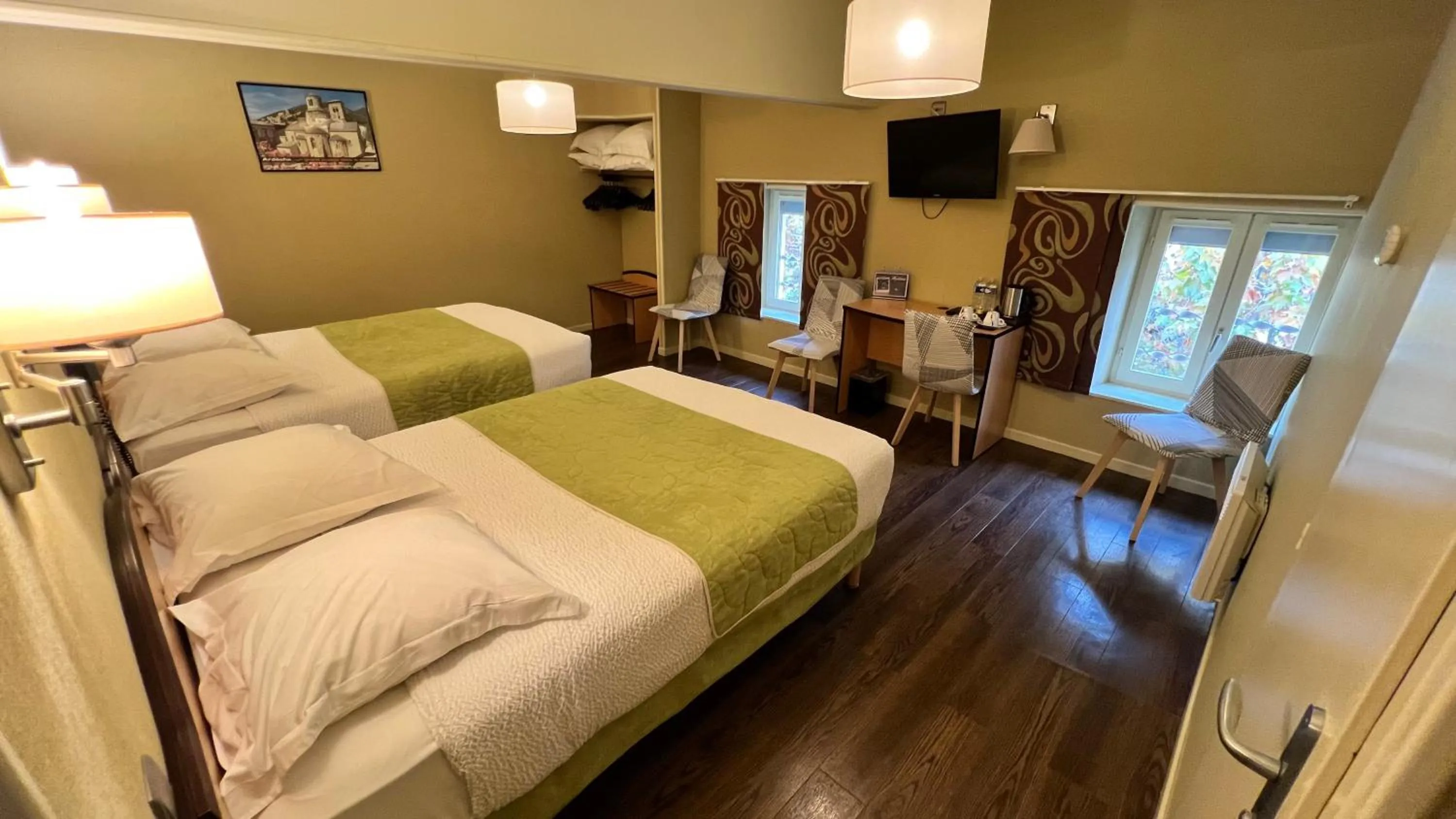 Photo of the whole room, Bed in Logis Hôtel Restaurant Azalées