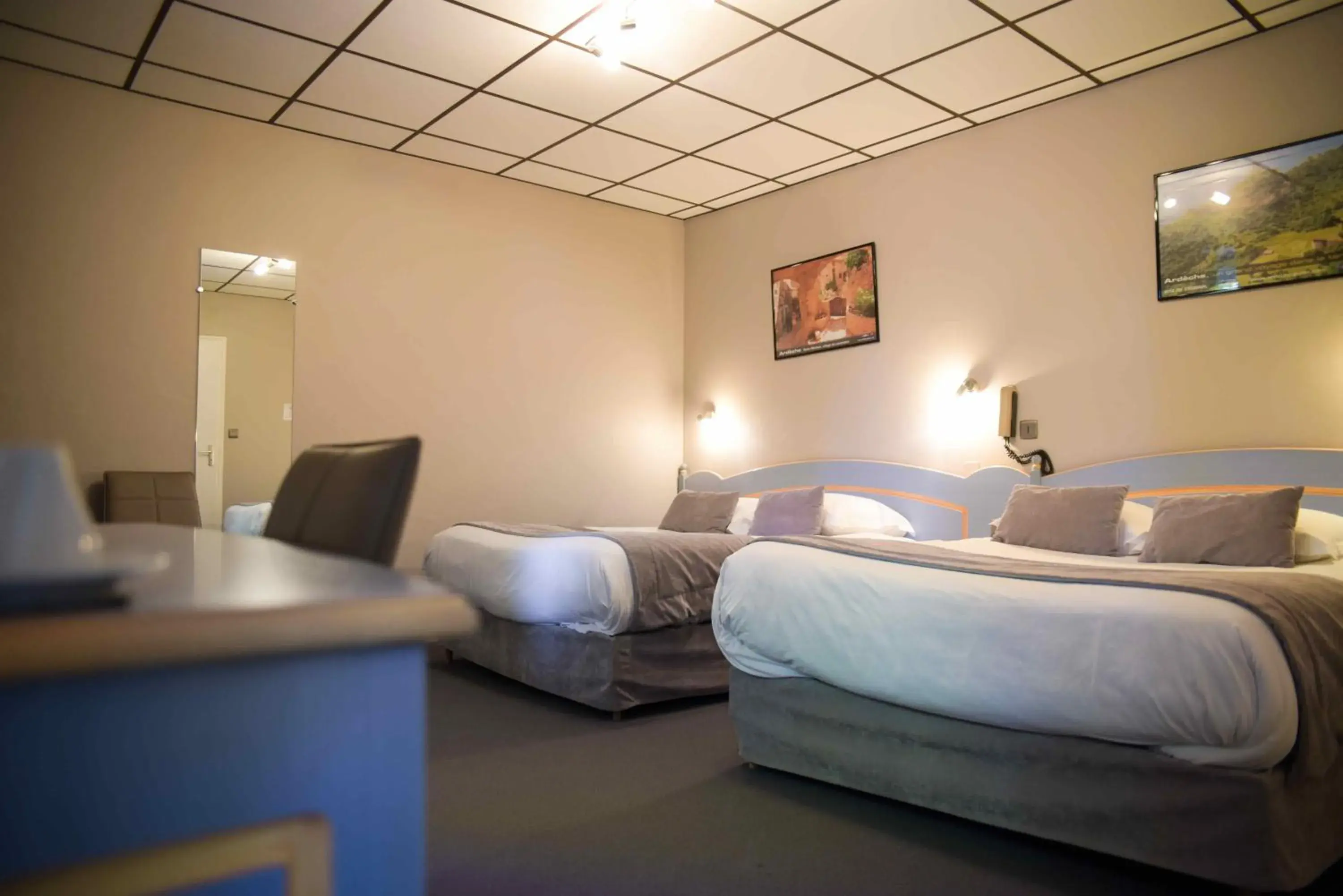 Photo of the whole room, Bed in Logis Hôtel Restaurant Azalées Photo of the whole room, Bed in Logis Hôtel Restaurant Azalées