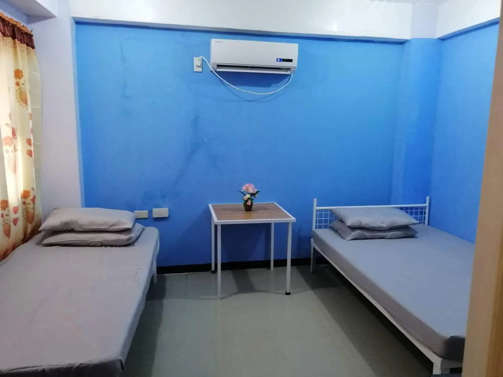 Photo of the whole room, Bed in RGC Residences