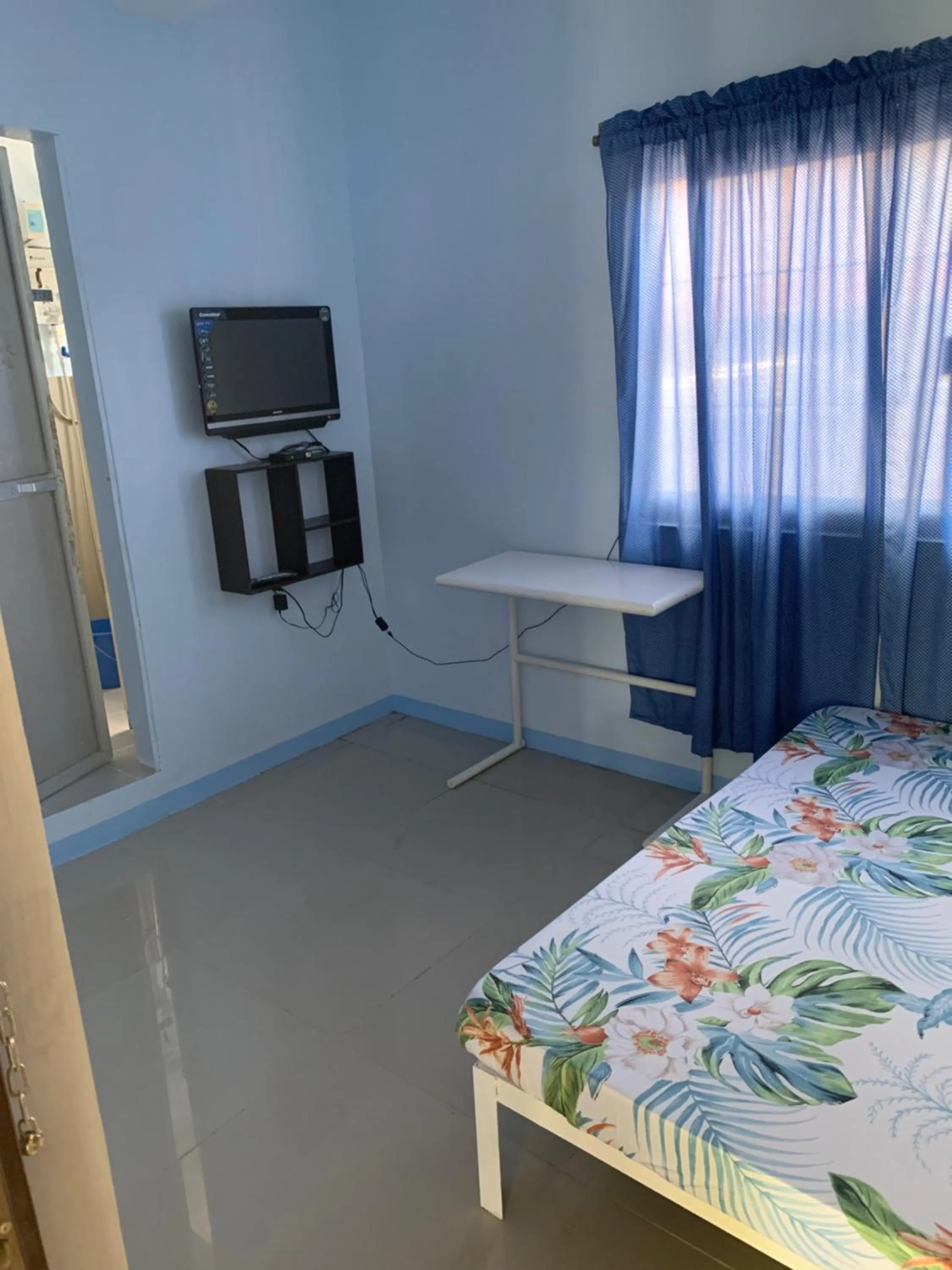 Photo of the whole room, Bed in RGC Residences