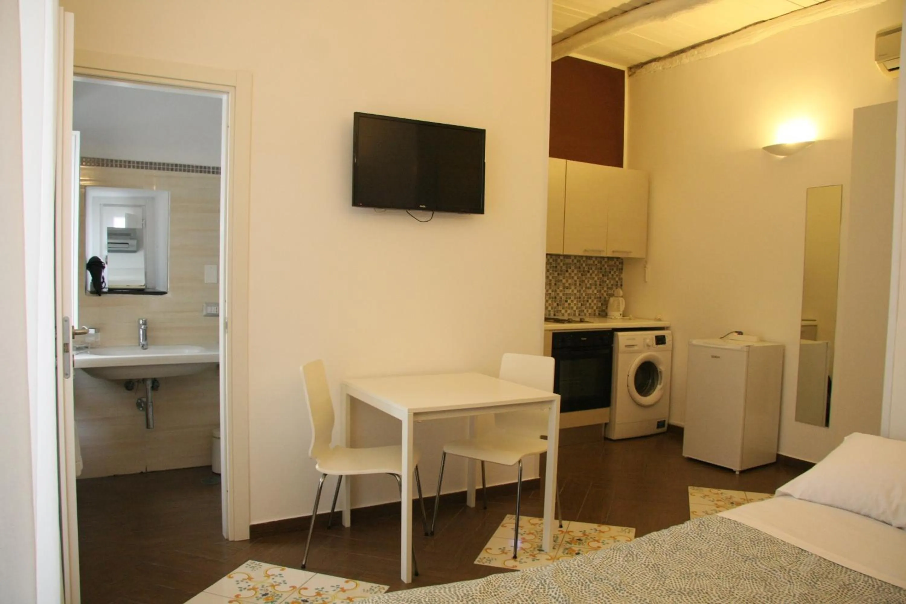 Bed in Palazzo della Poesia Casa Vacanze