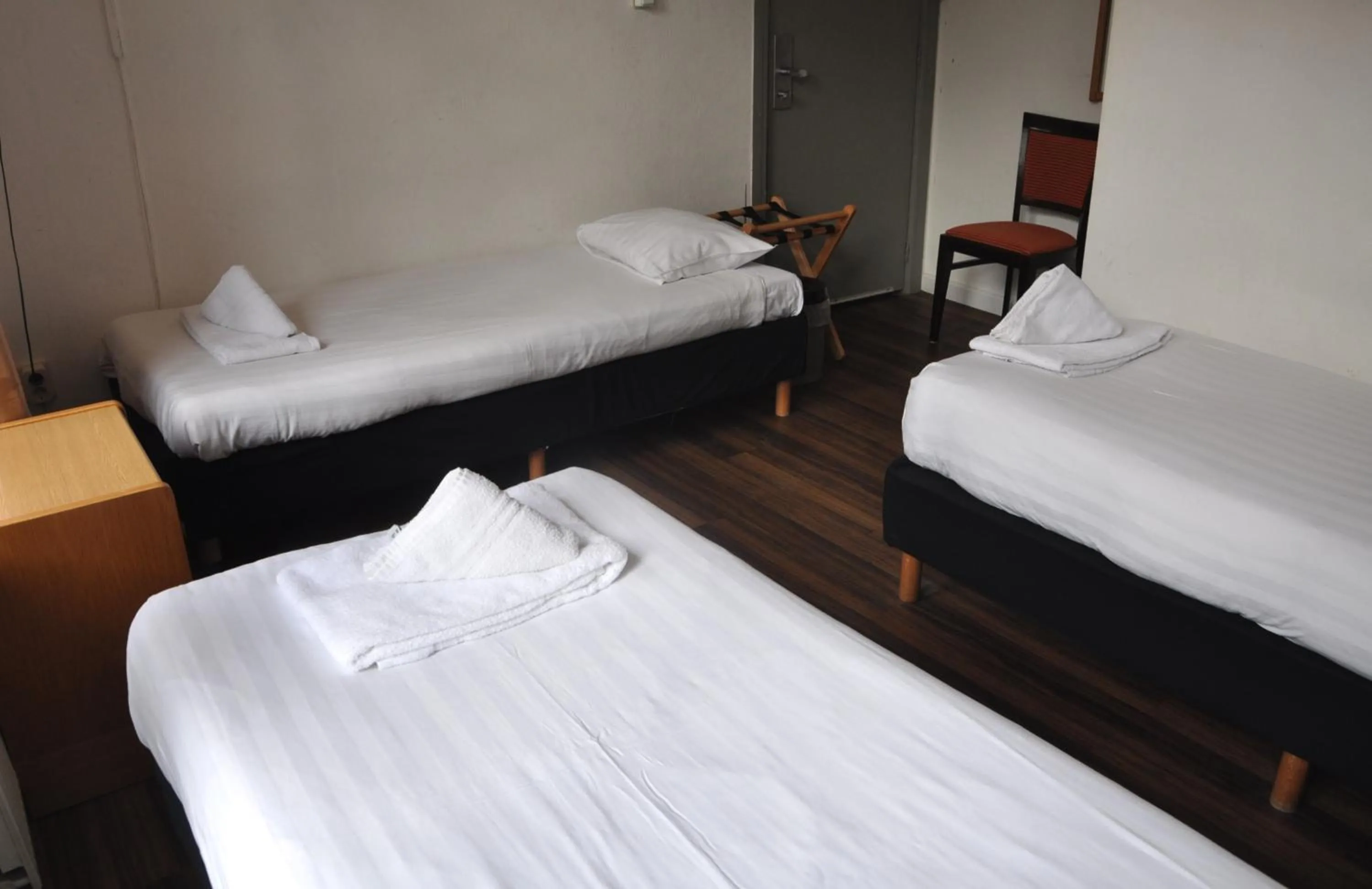 Bed in Hotel Amsterdam Inn