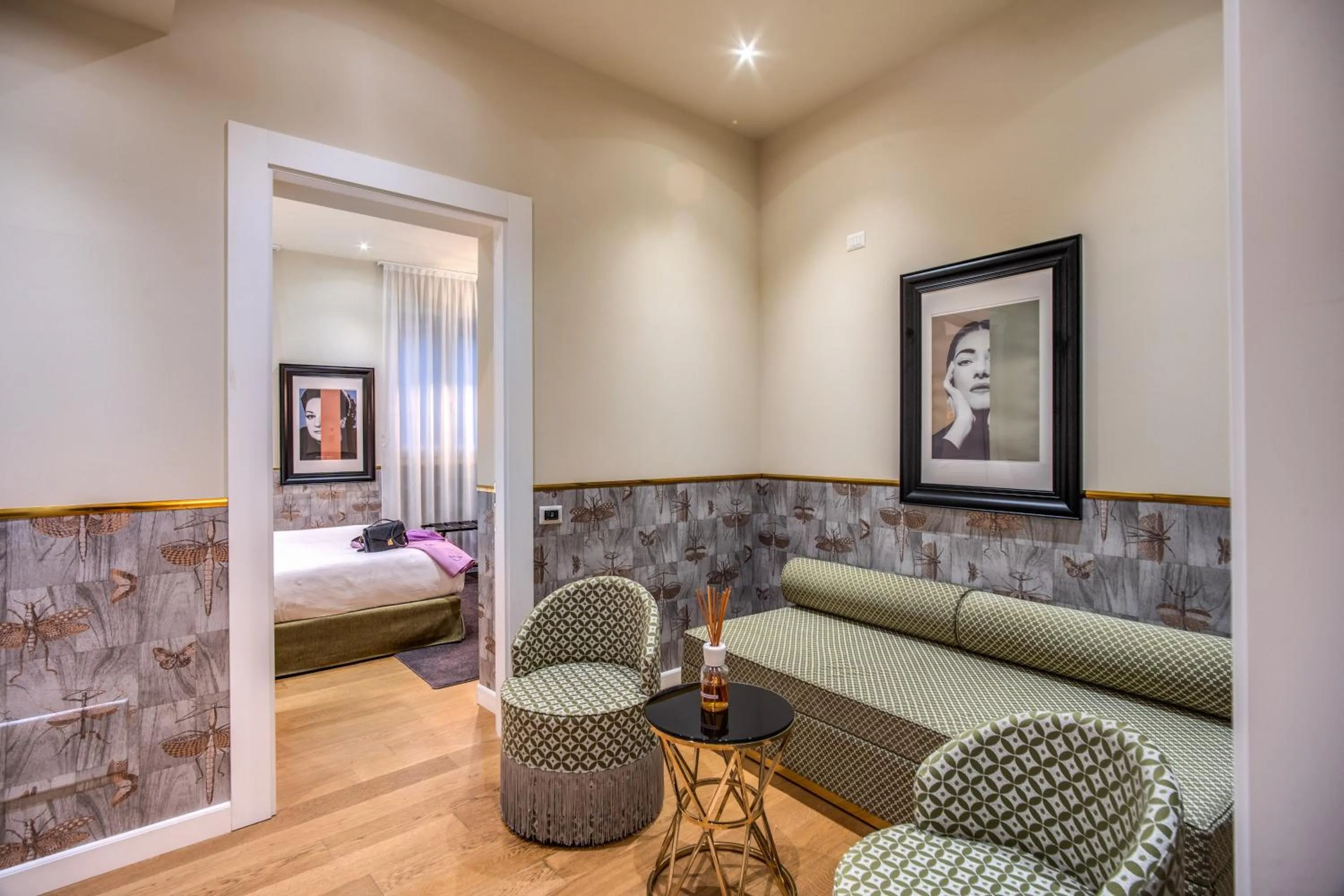 Living room, Bed in The Talent Hotel