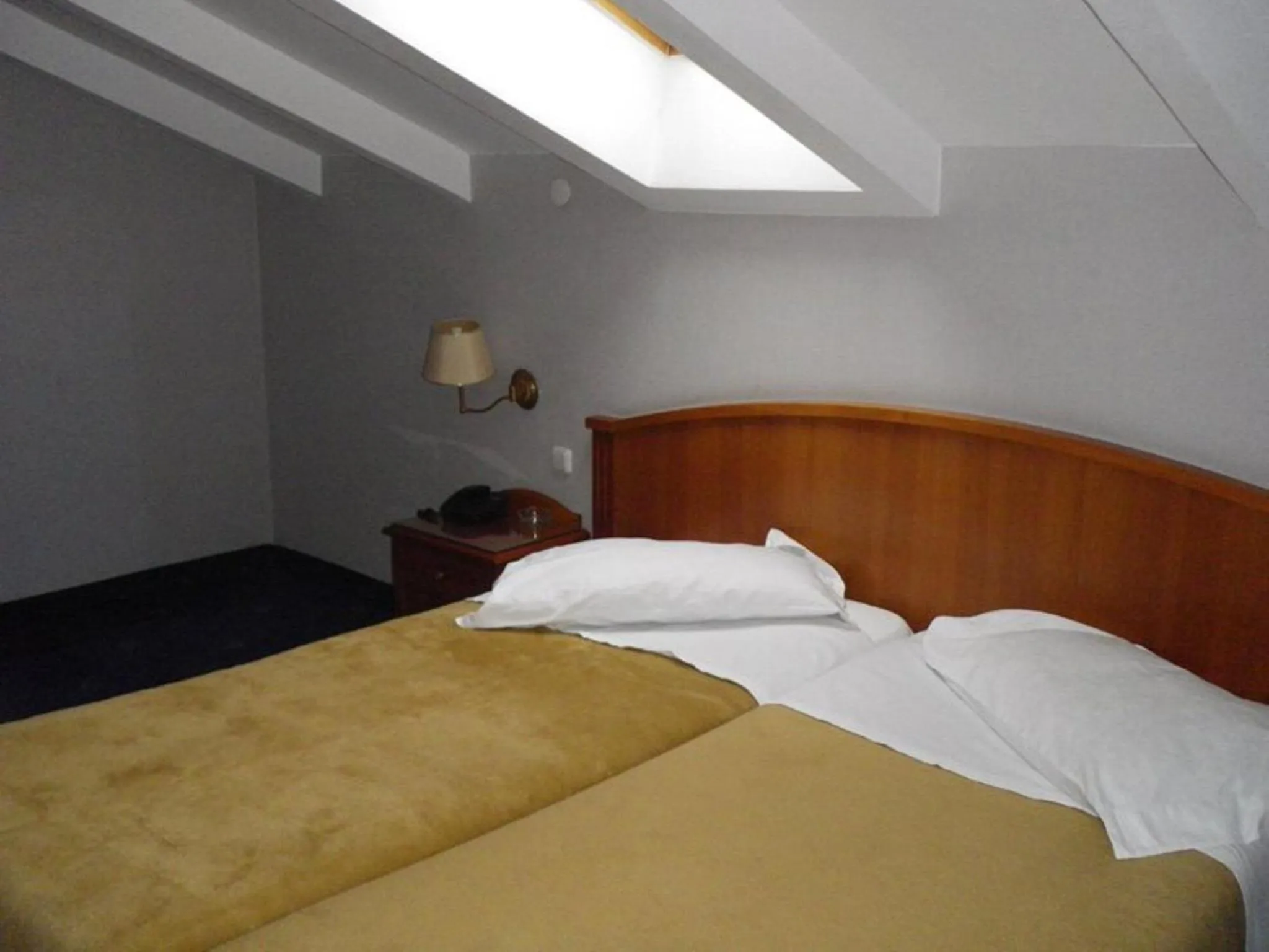 Bed in Hotel Kastoria in Kastoria City
