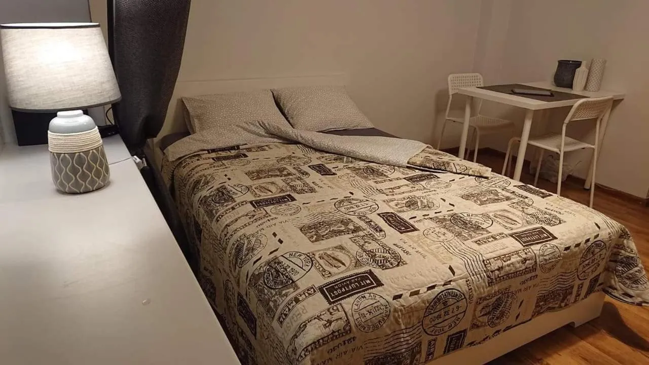 Bed in Karoso Apartment