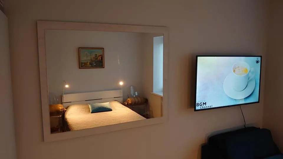 Bed in Karoso Apartment