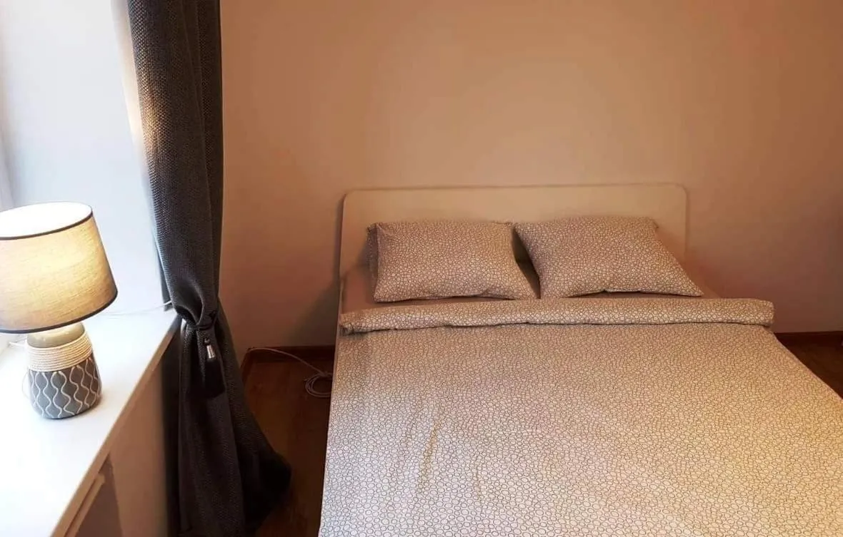 Bed in Karoso Apartment