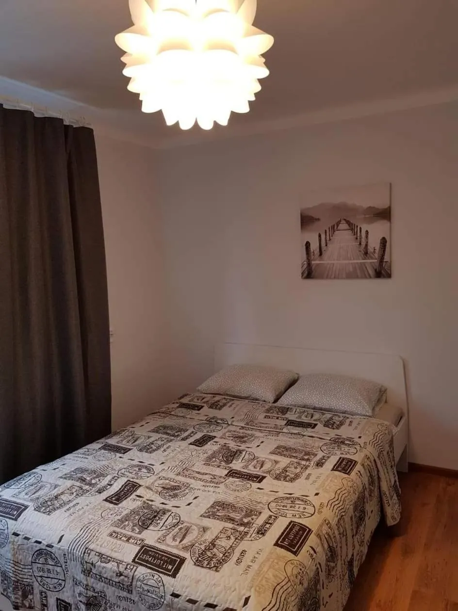 Bed in Karoso Apartment