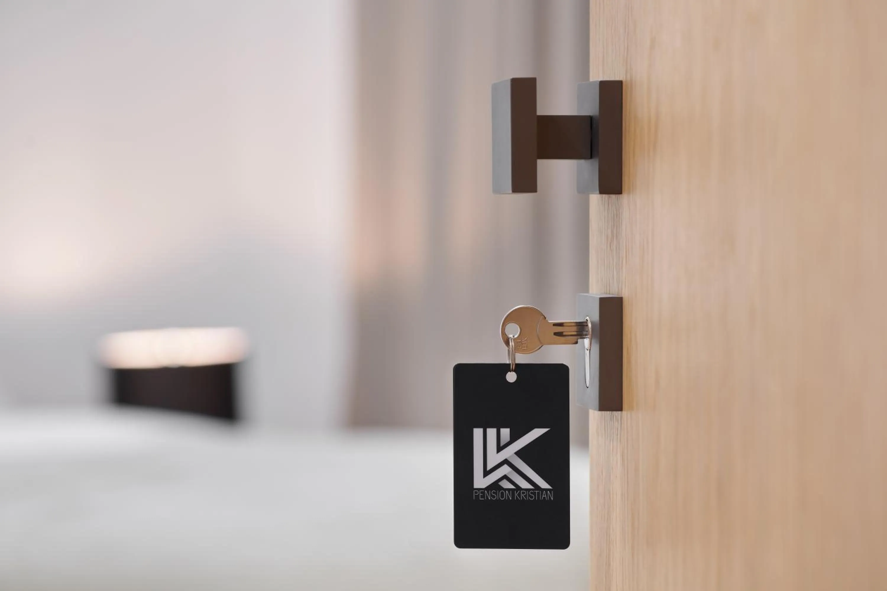 Property logo or sign in Pension Kristian by KH