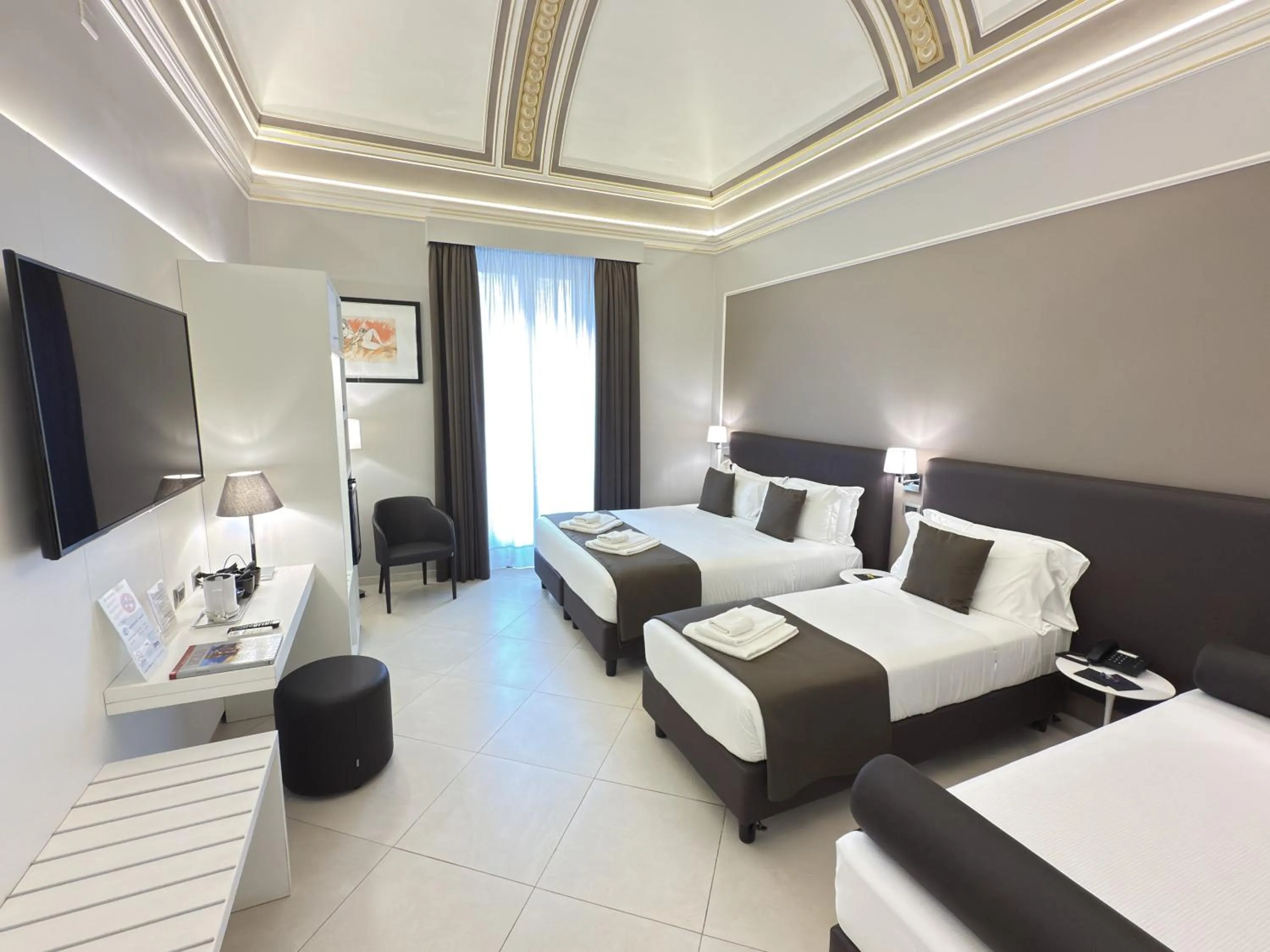 Bed in ETNEA STYLE CATANIA LUXURY ROOMS