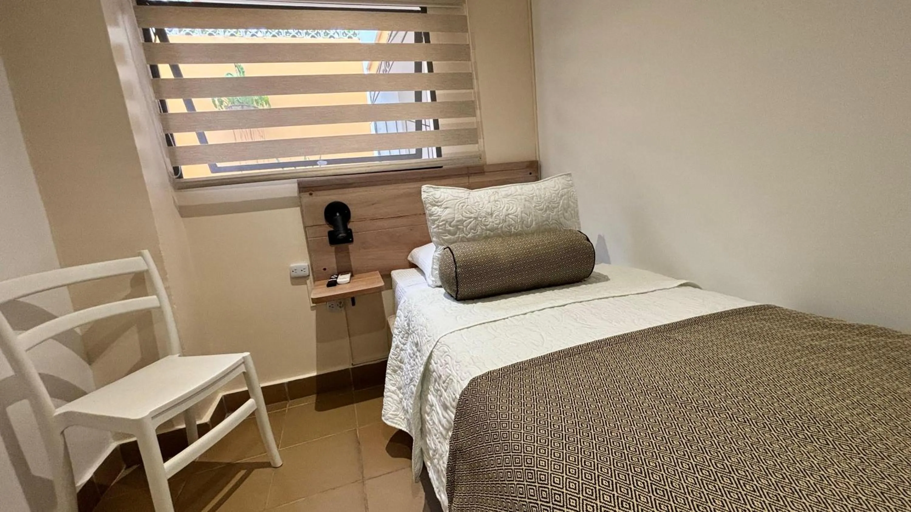 View (from property/room), Bed in Hotel La Gloria