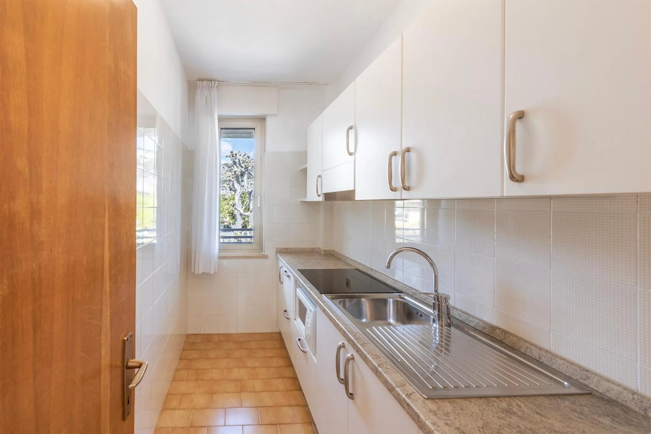 Kitchen or kitchenette in Residence Casa al Sole Apartments