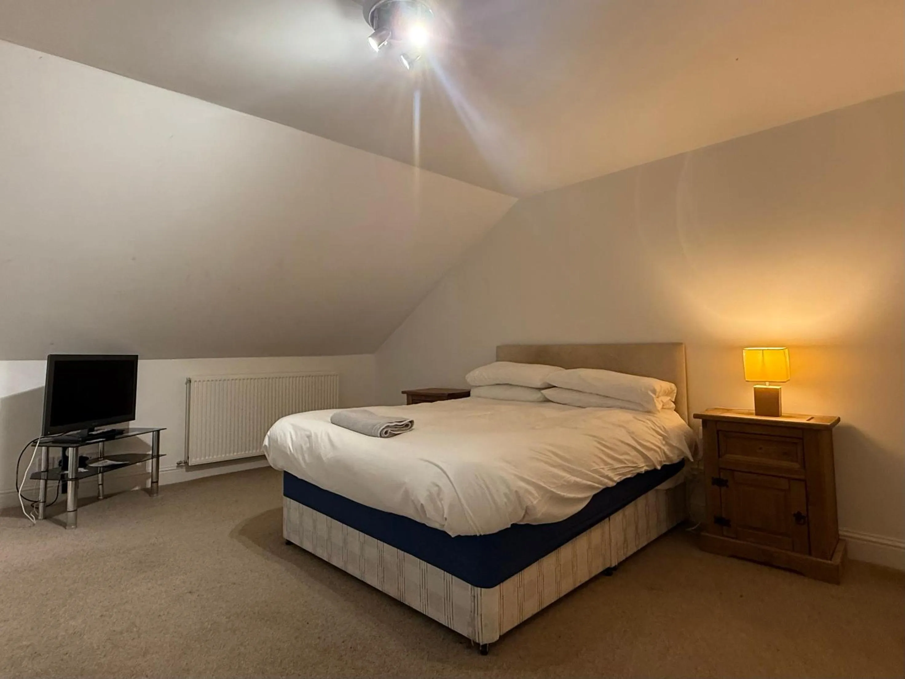 Bed in The Orchard Hotel