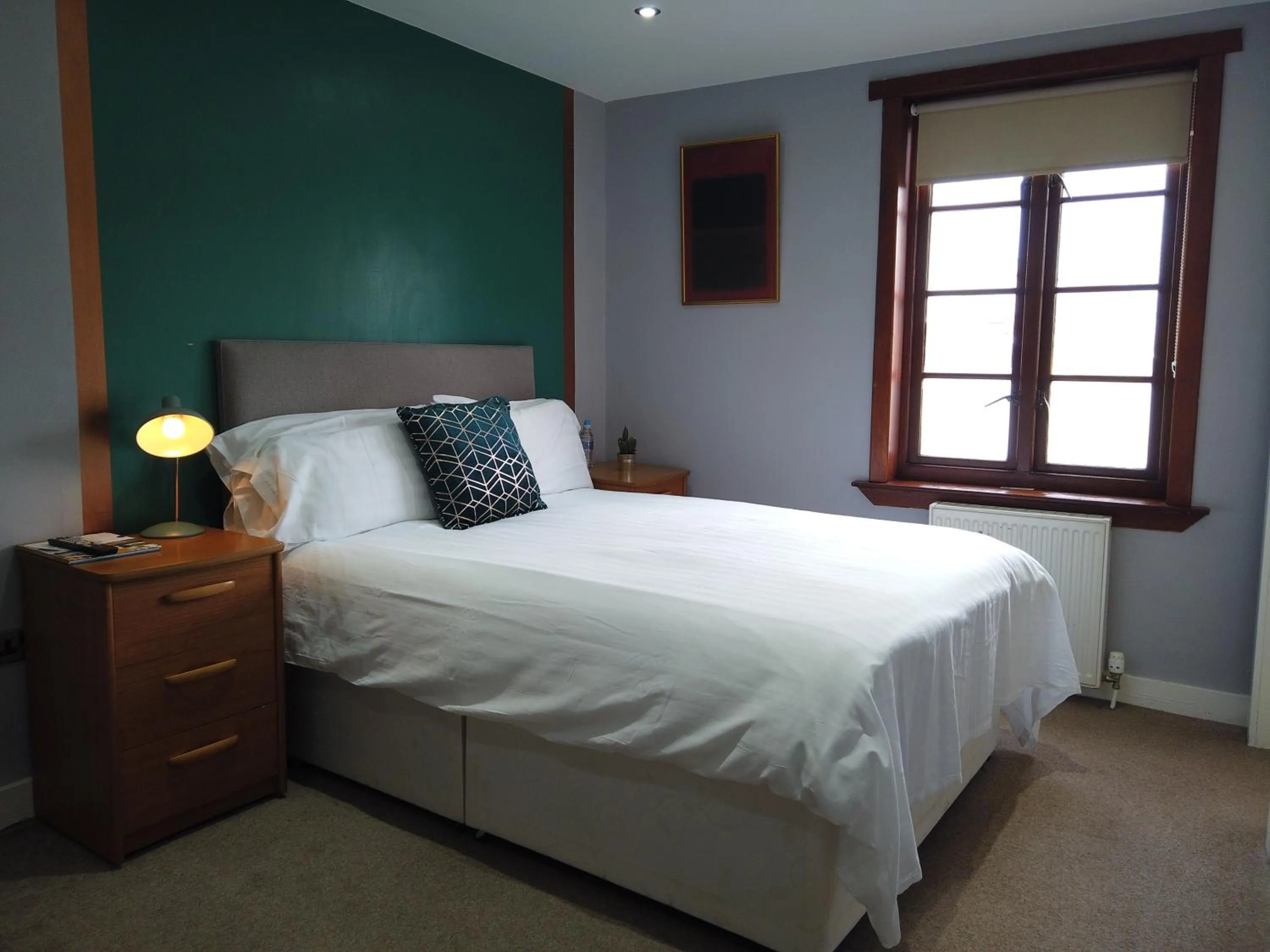 Bed in The Orchard Hotel