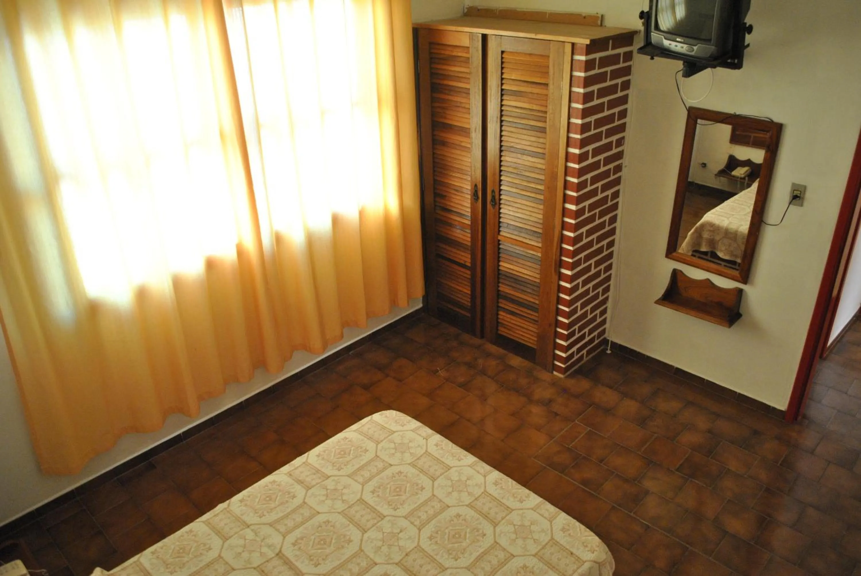 Bedroom in Residencial Sol e Mar de Floripa