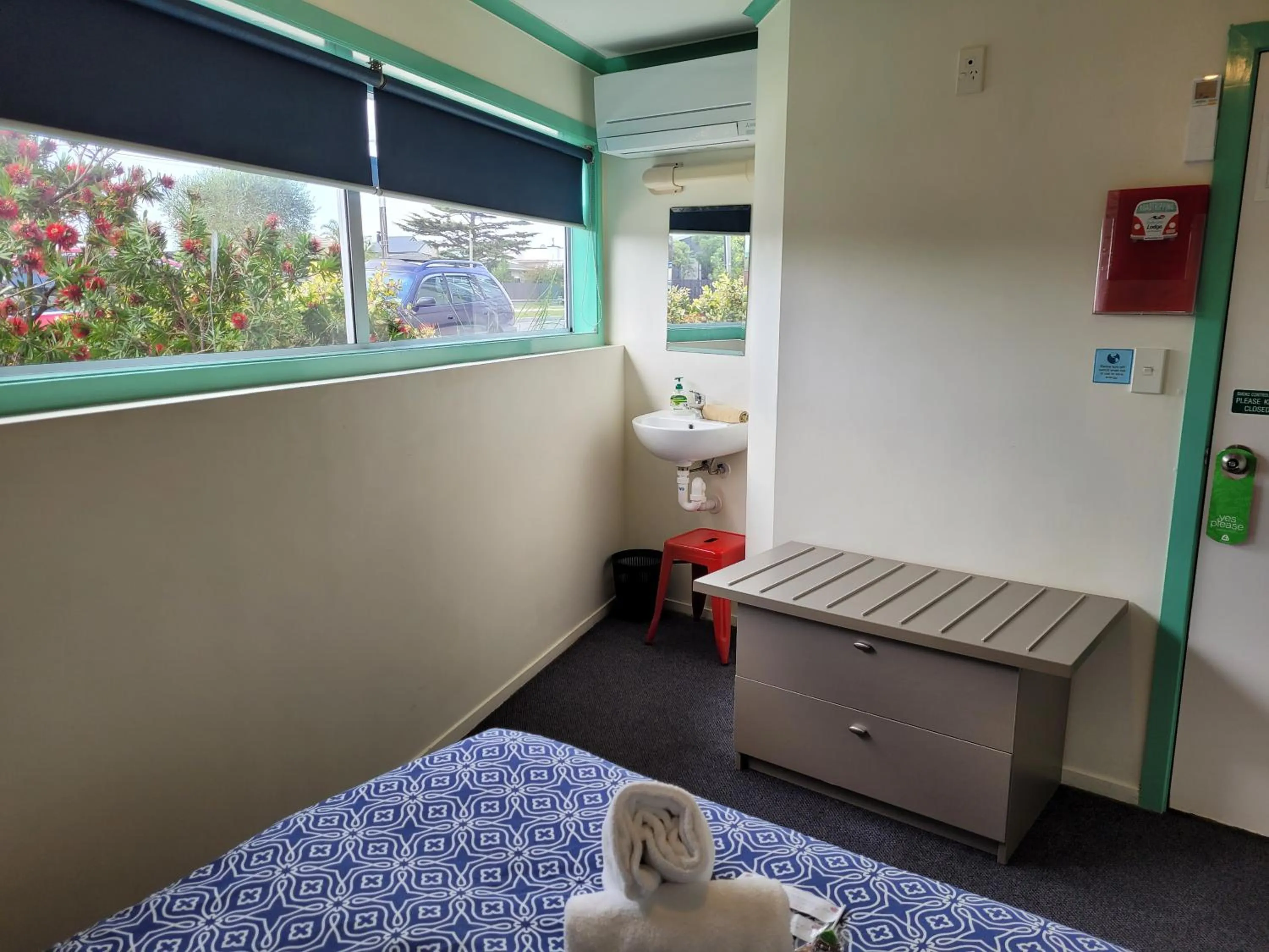 Photo of the whole room, Bed in Pacific Coast Lodge and Backpackers