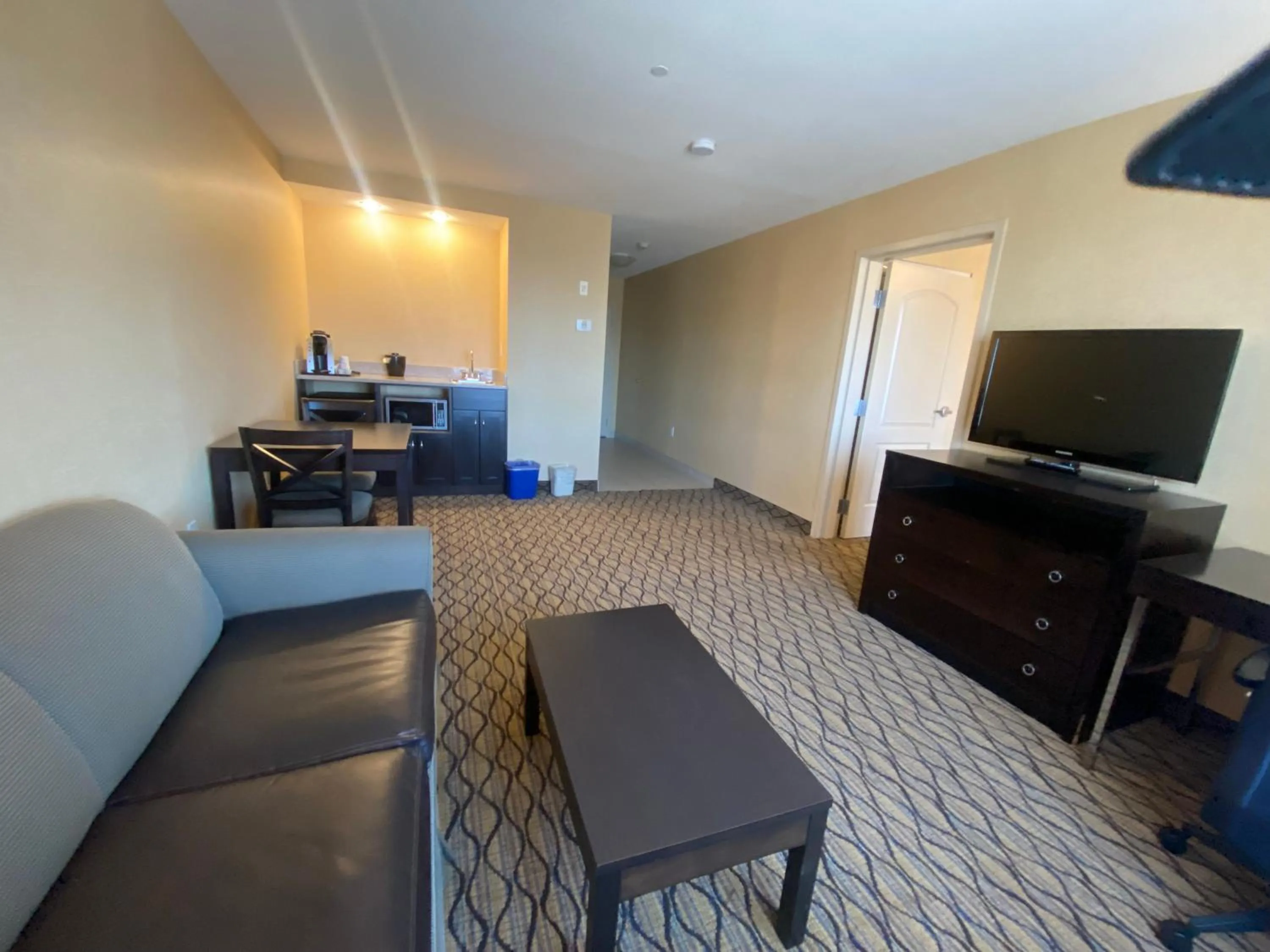 Communal lounge/ TV room in Wingate by Wyndham Fort Saskatchewan