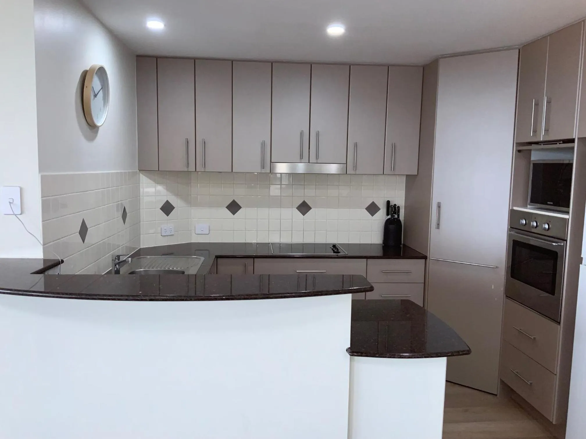 kitchen in Meridian Alex Beach Apartments