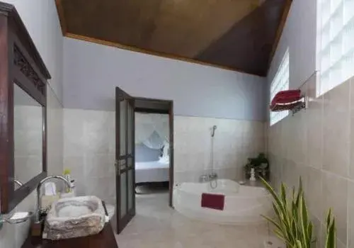 Bathroom, Bed in Baliku Dive Resort Bathroom, Bed in Baliku Dive Resort
