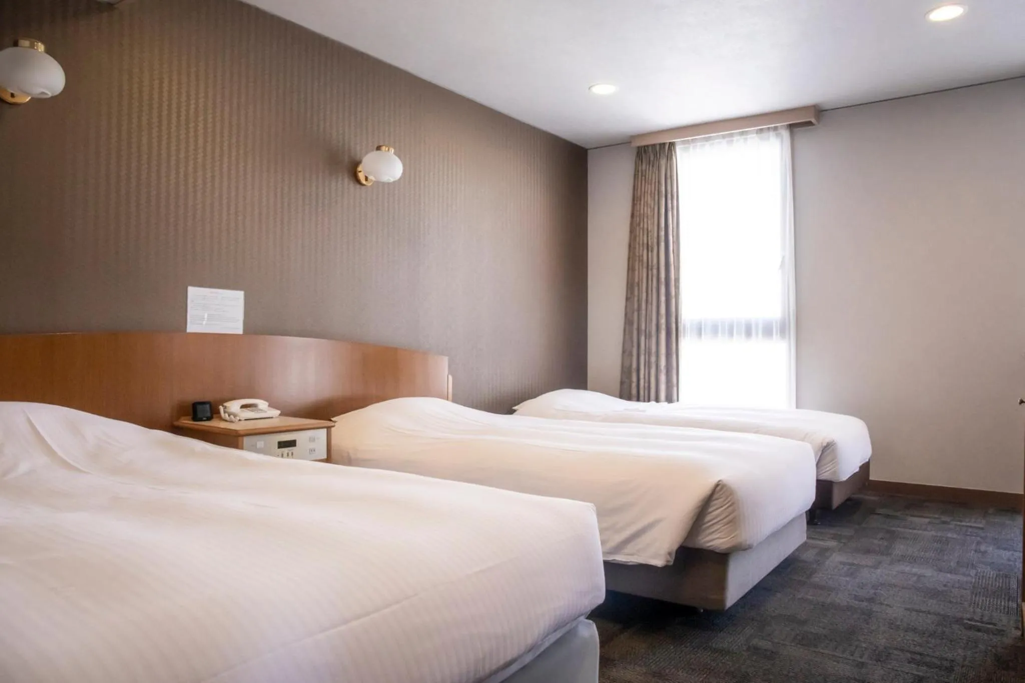 Bed in Hotel Kajiwara