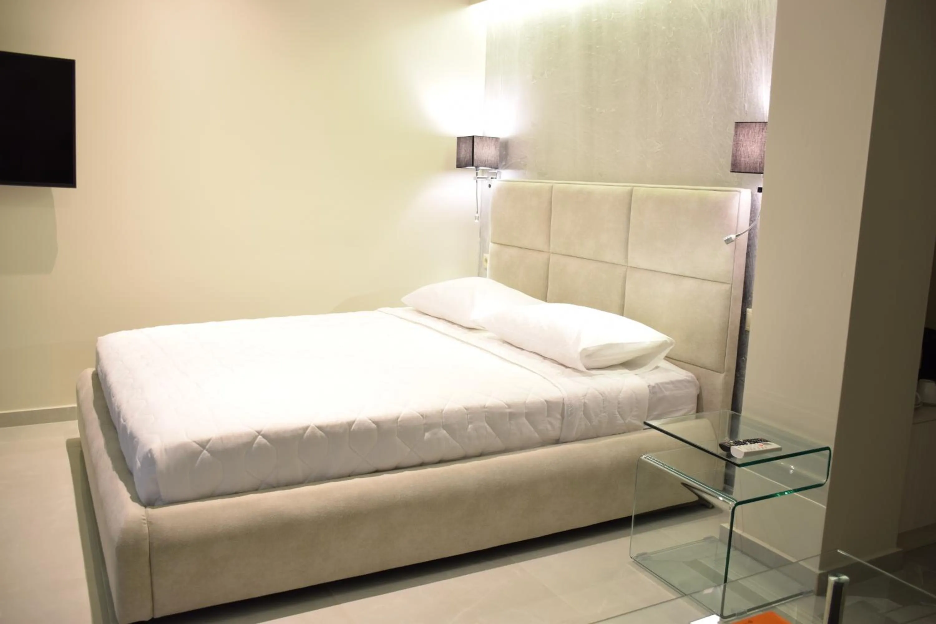 Bed in 24K Athena Suites