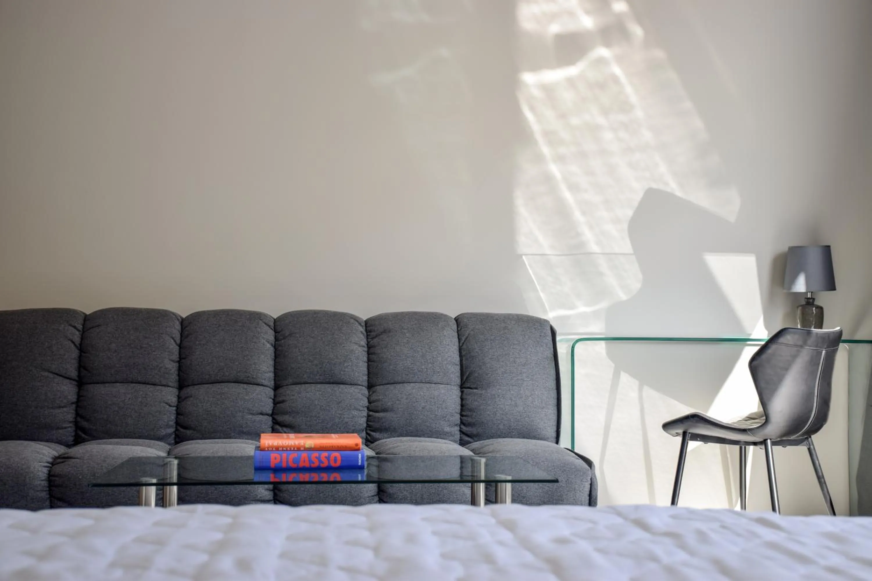 Seating area in 24K Athena Suites