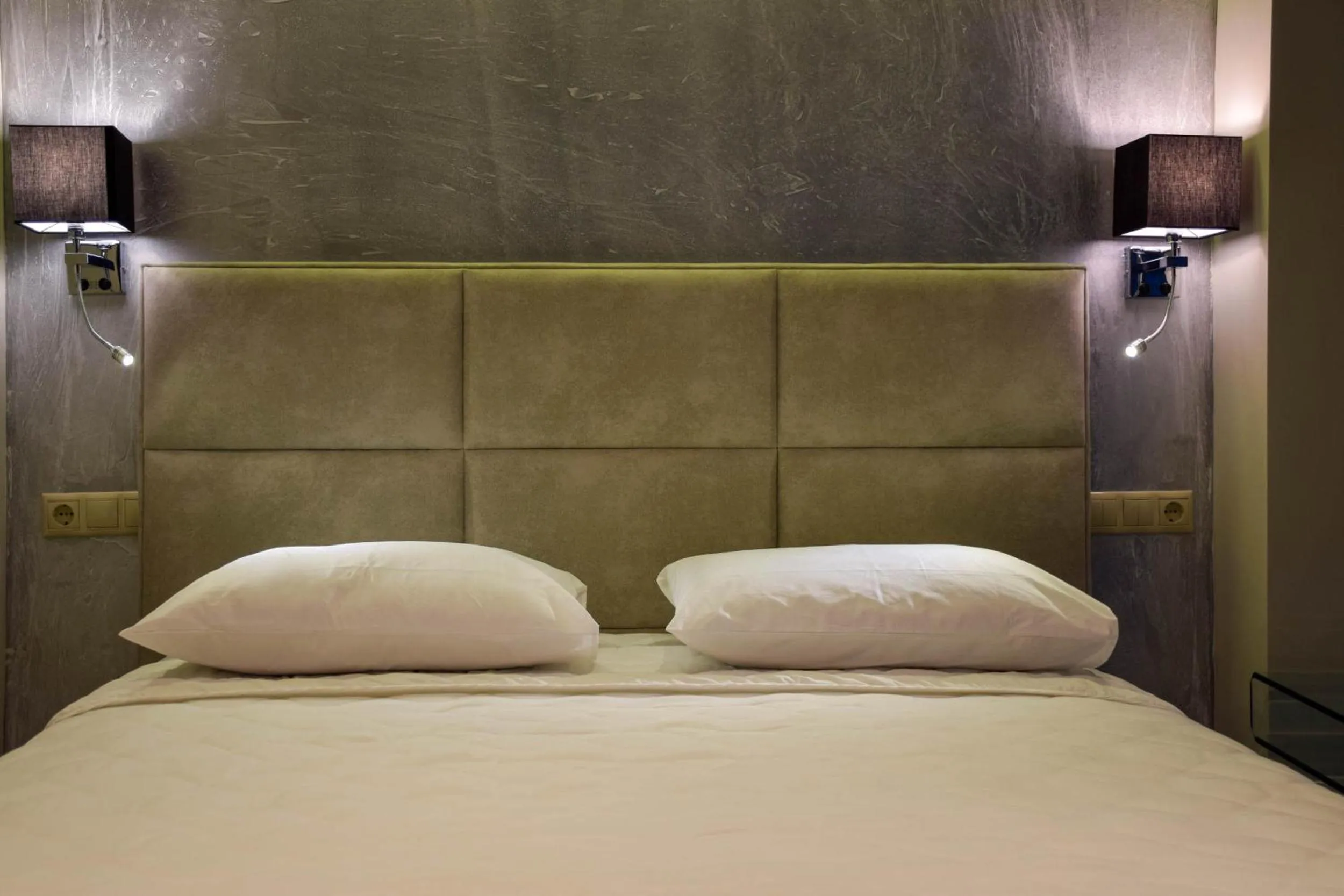 Bed in 24K Athena Suites