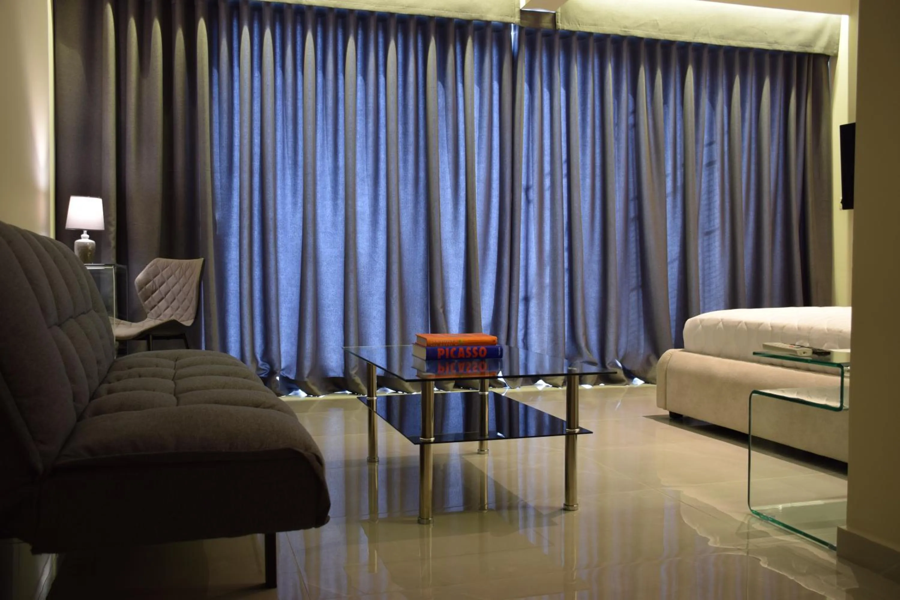 Living room in 24K Athena Suites