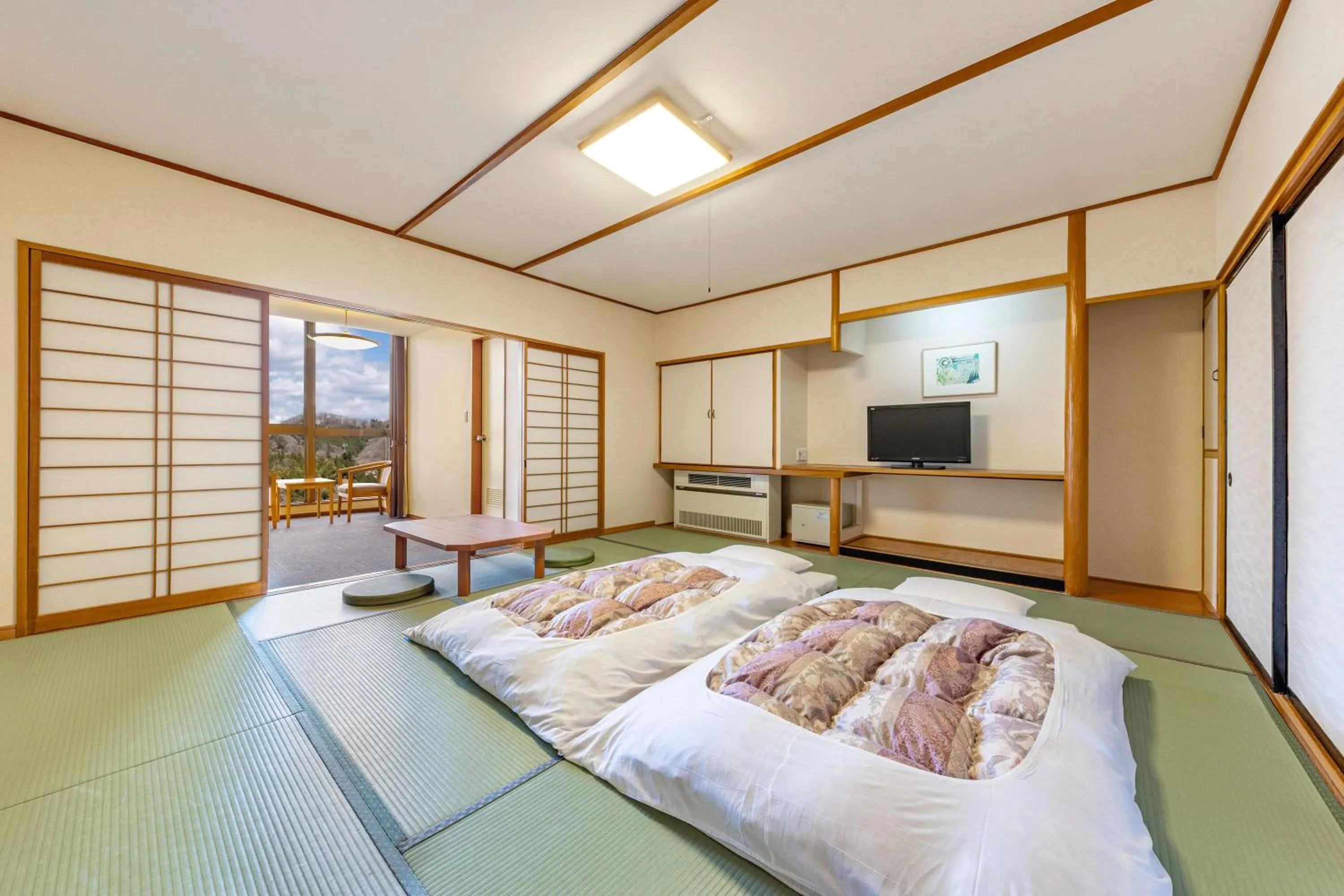 Photo of the whole room, Bed in Spa Resort Hawaiians Hotel Hawaiians