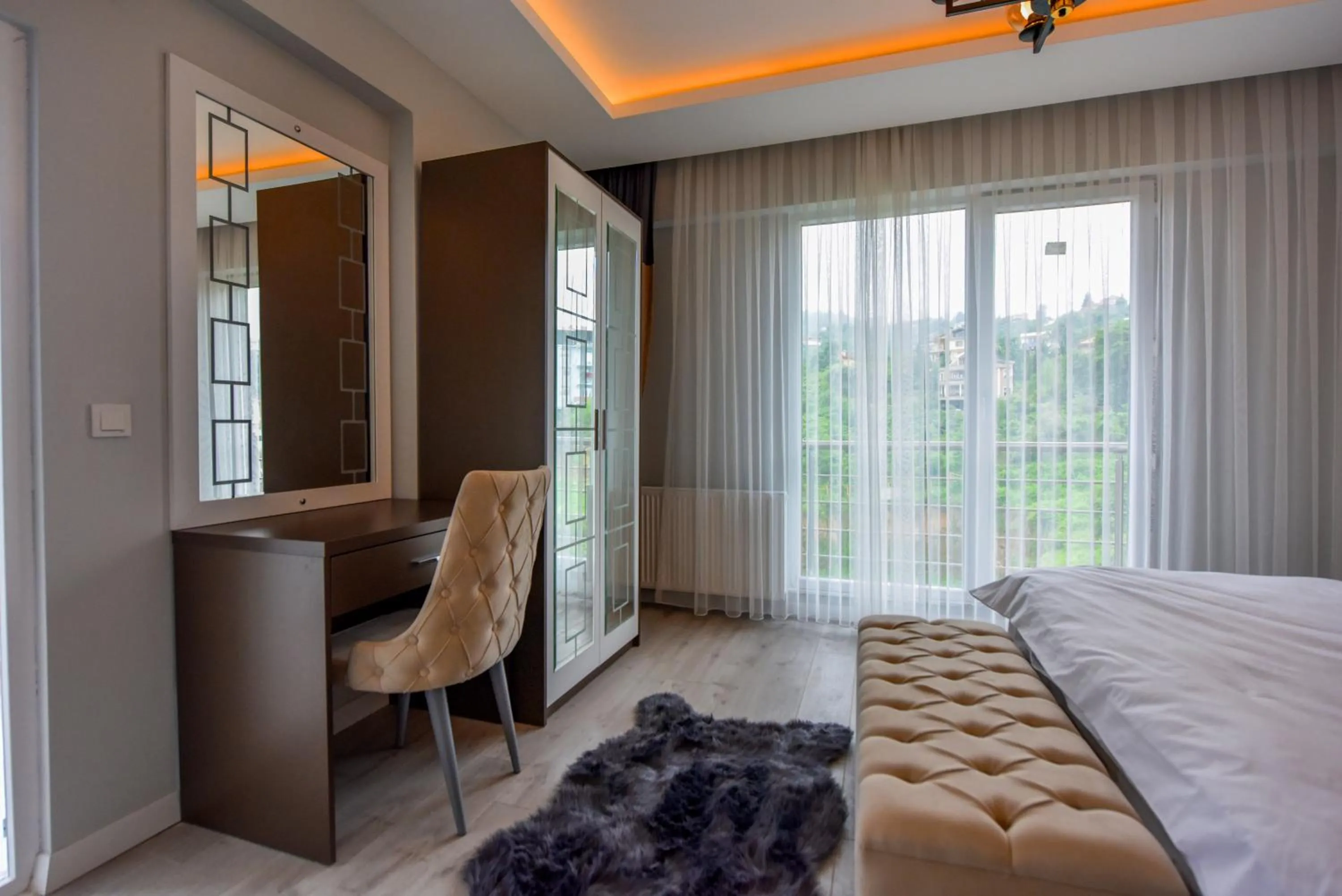 Photo of the whole room, Bed in BAHAR RESIDENCE