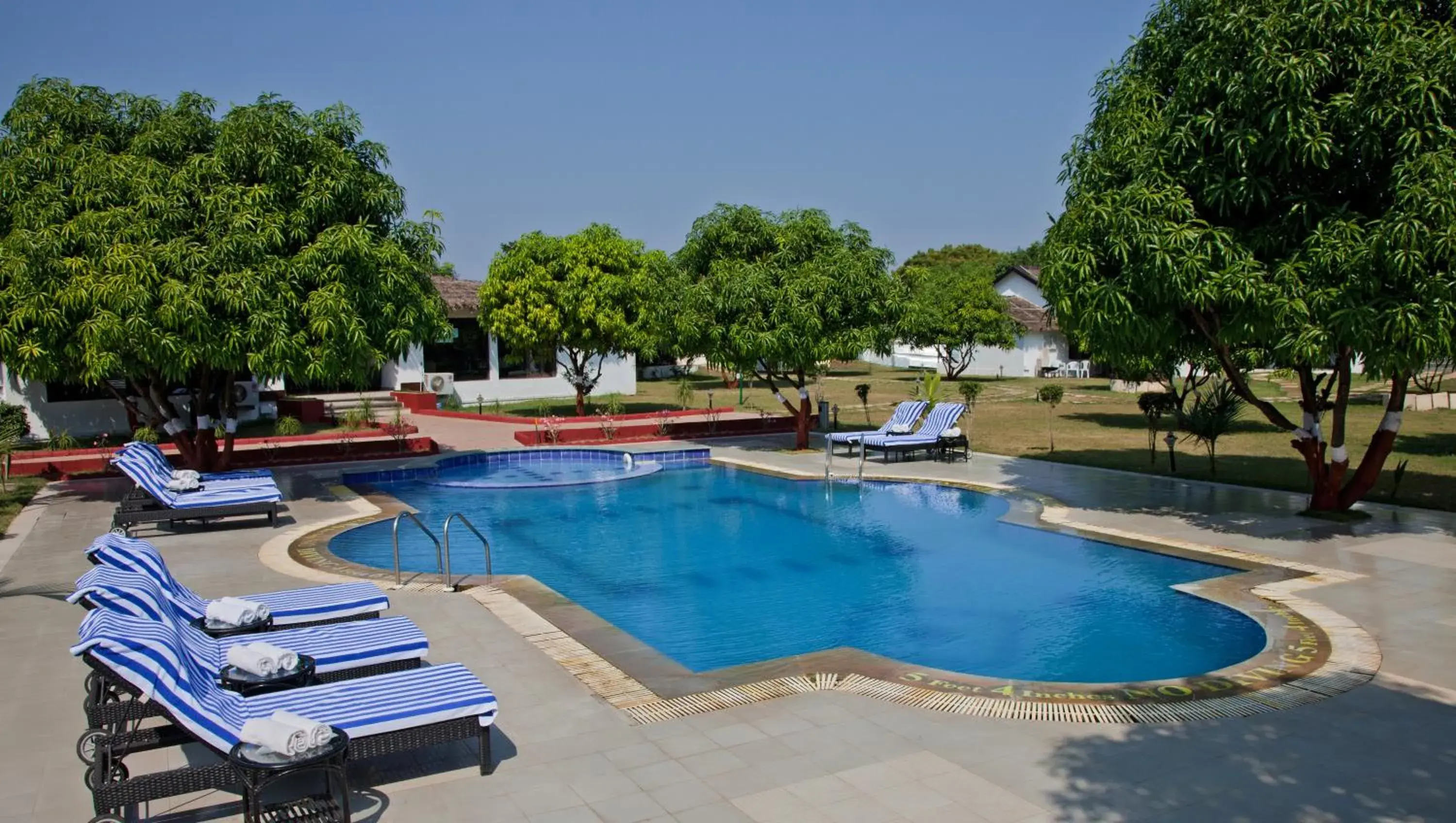 Swimming pool in Club Mahindra Sasan Gir Swimming pool in Club Mahindra Sasan Gir