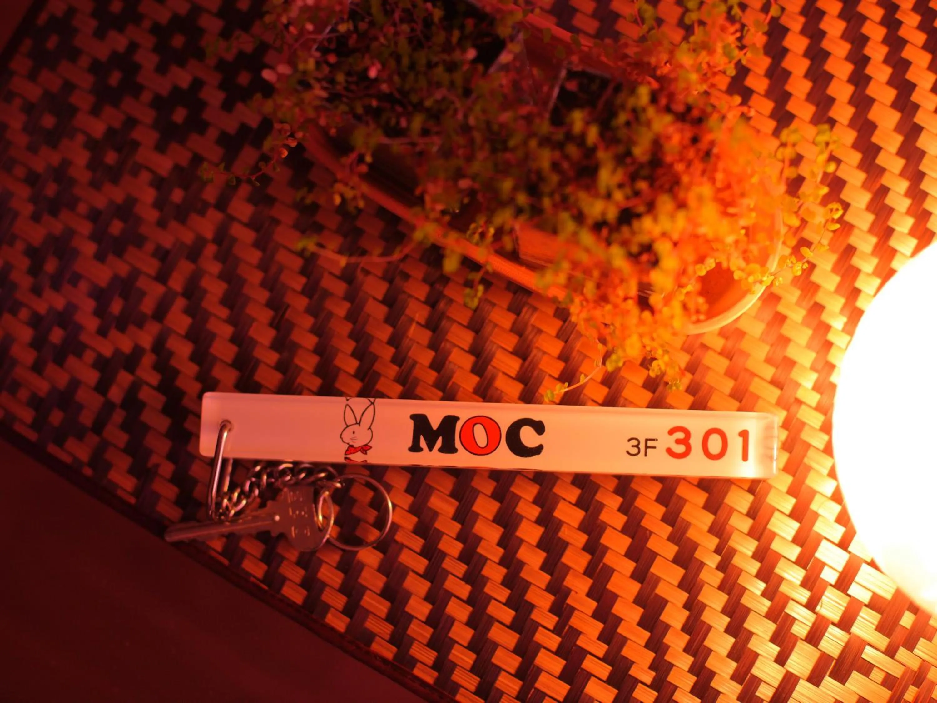 Property logo or sign in Hotel Moc