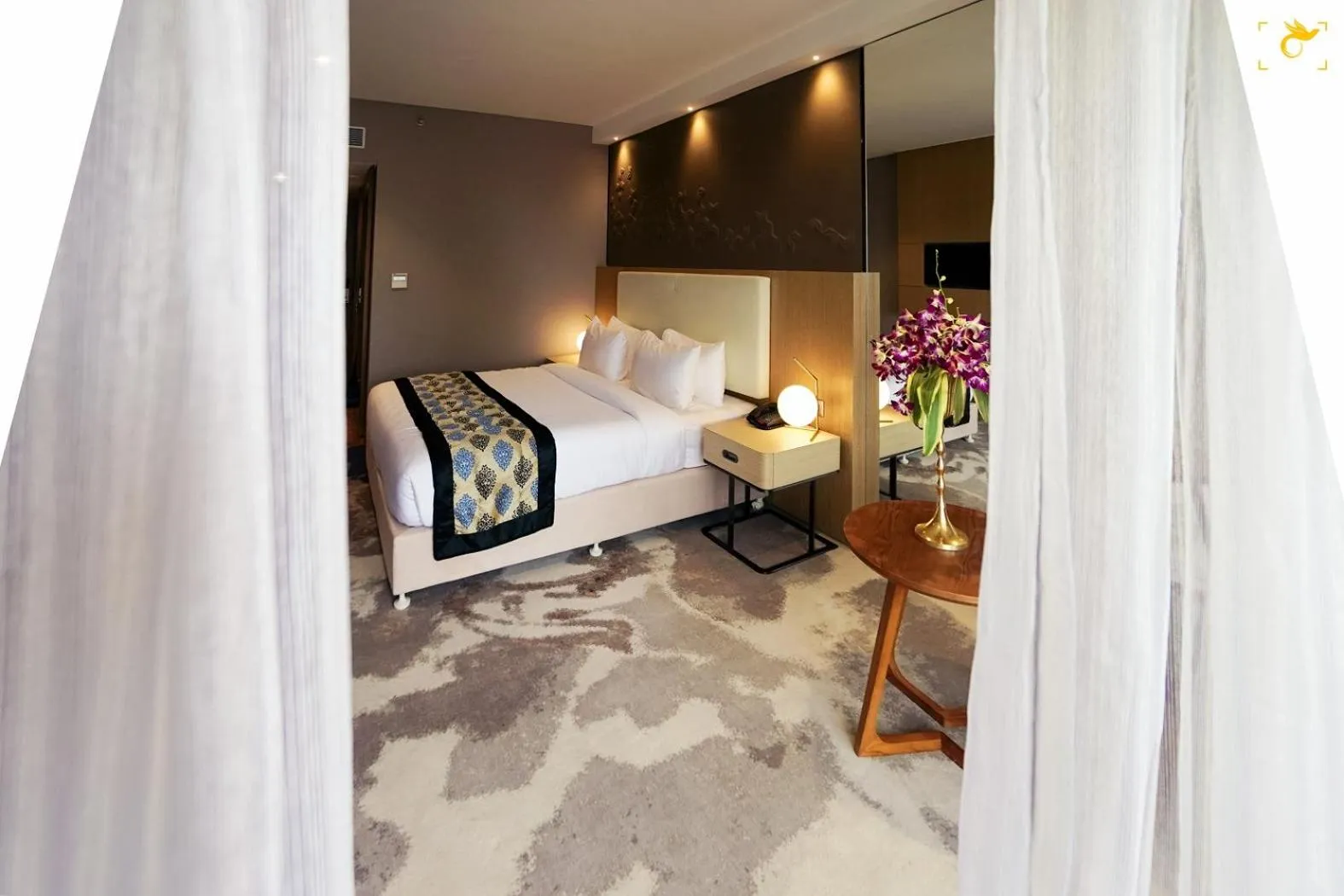 Bed in Clarks Inn Suites Raipur