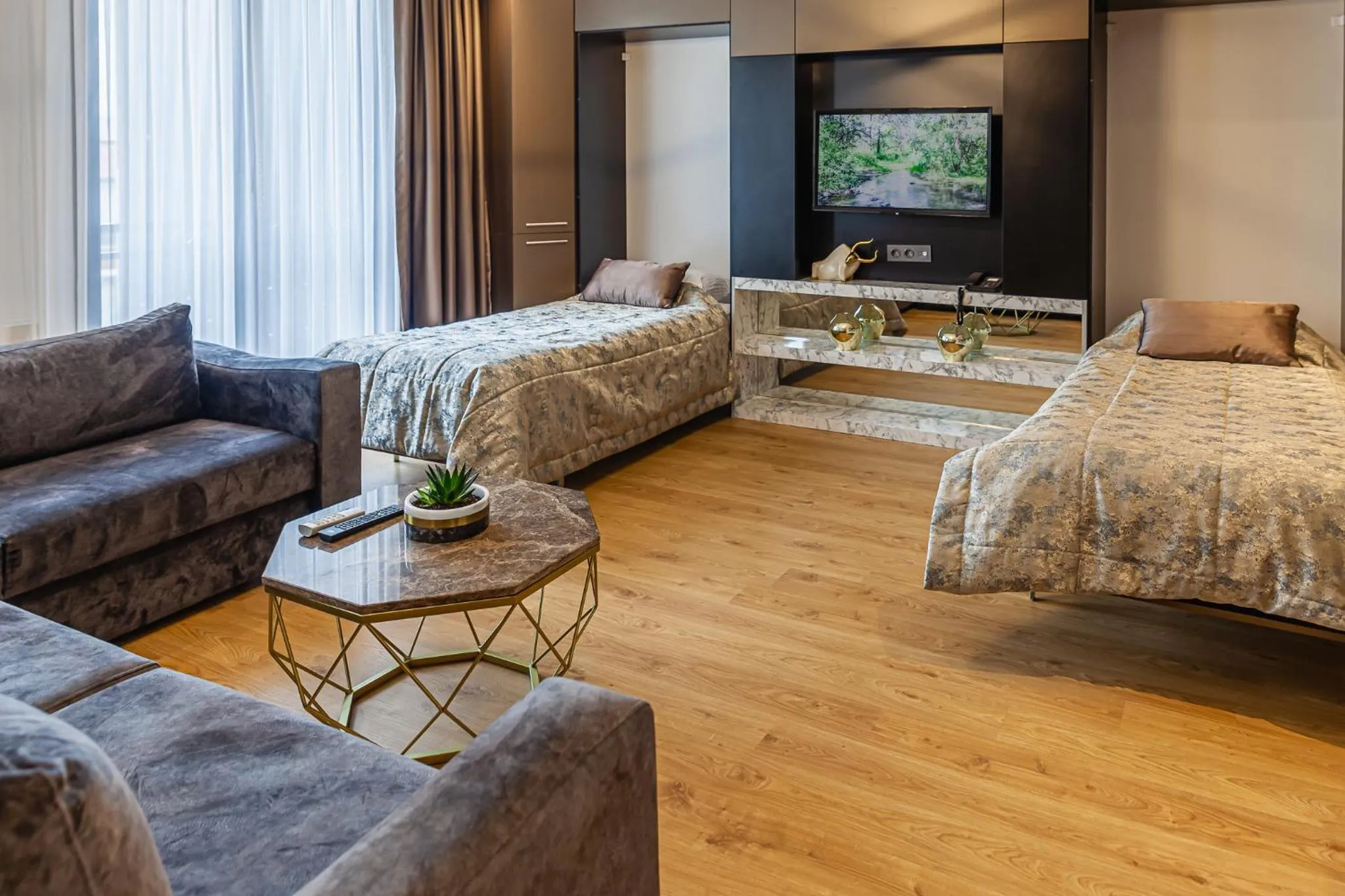 Living room, Bed in Norah Suites Hotel İstanbul