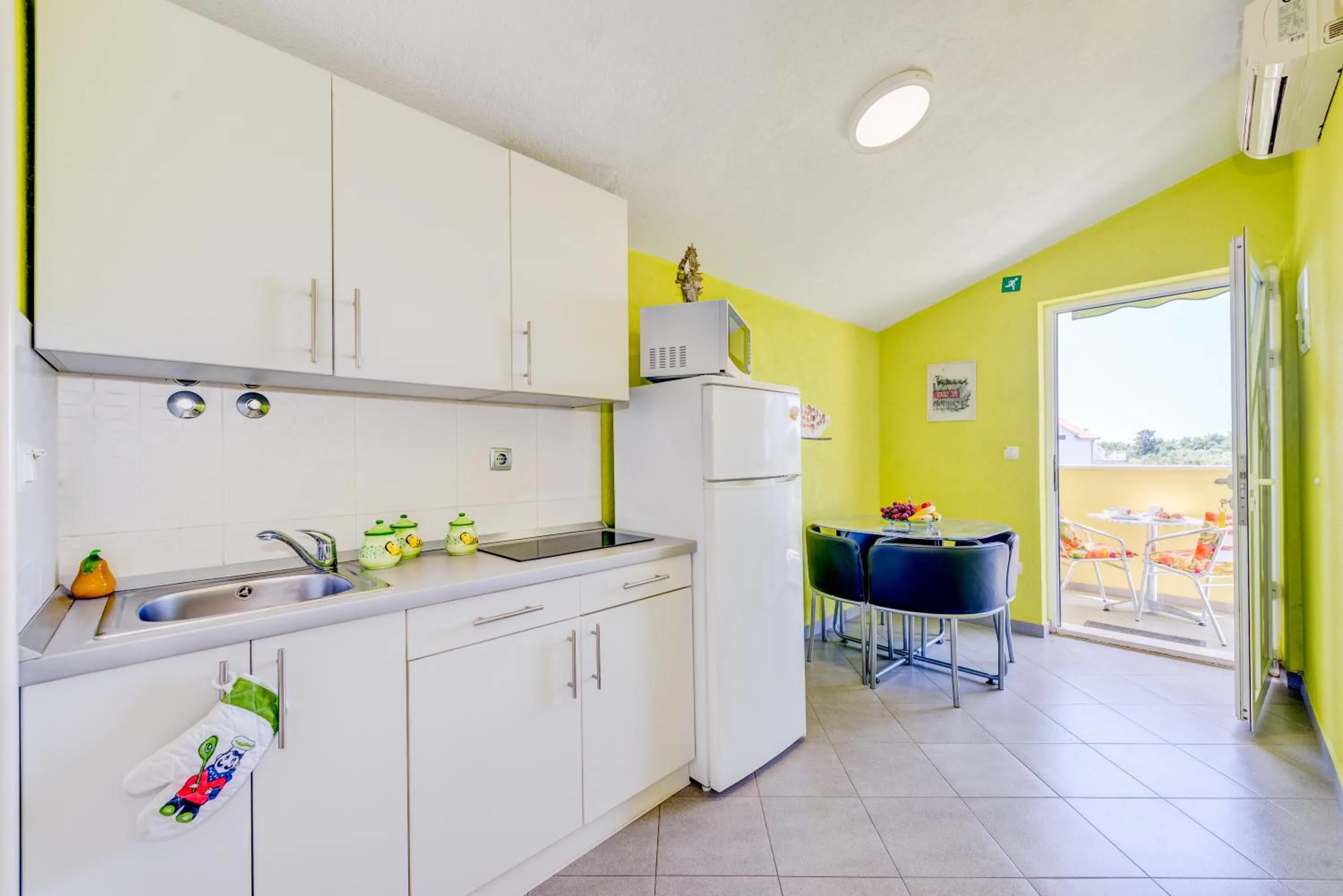 Kitchen or kitchenette in Apartments Petra
