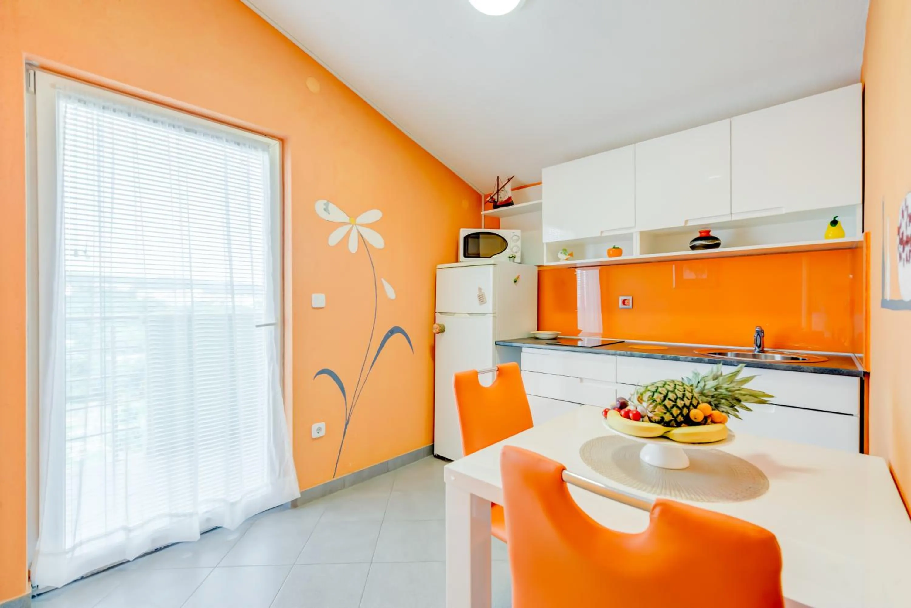 Kitchen or kitchenette in Apartments Petra