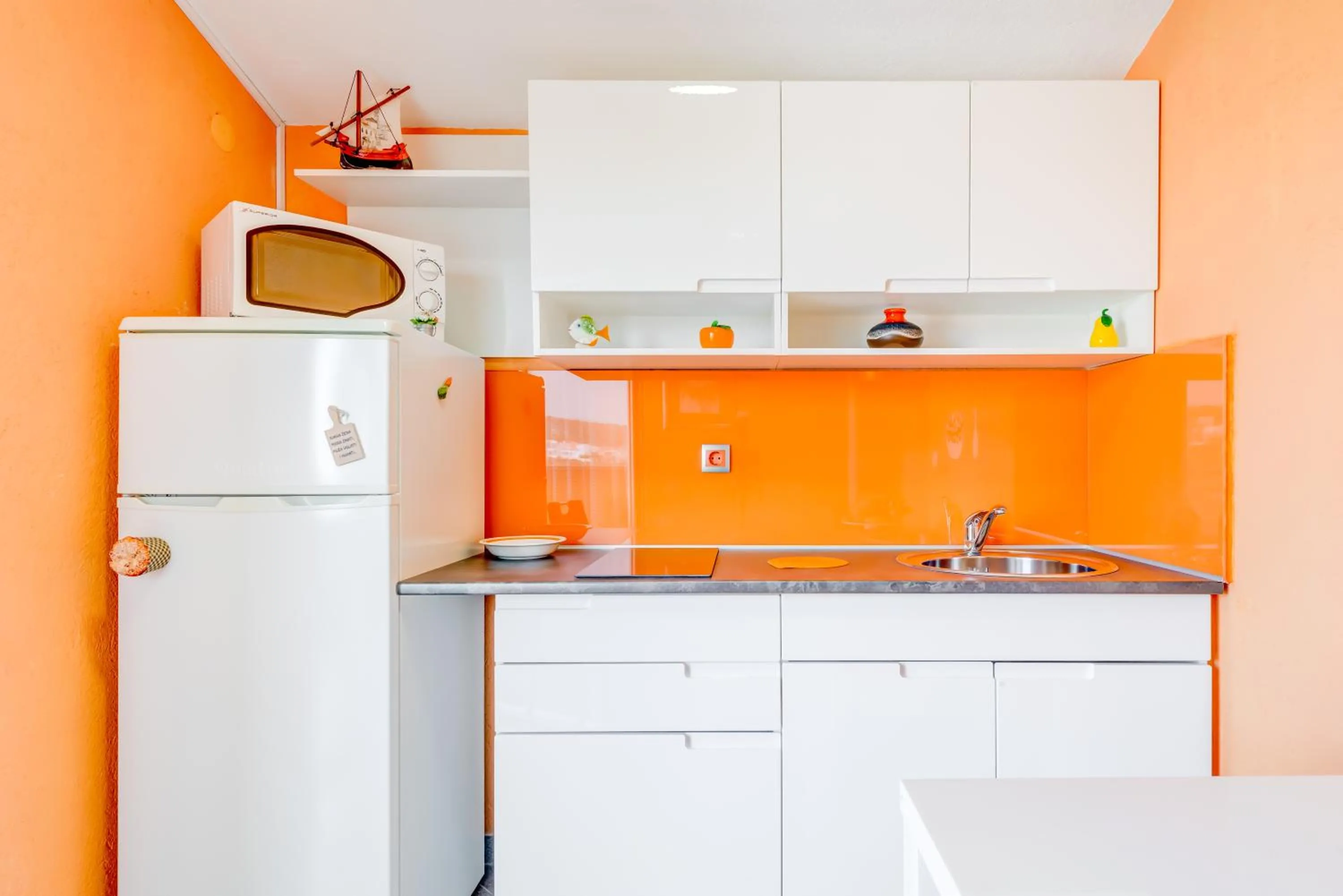 Kitchen or kitchenette in Apartments Petra