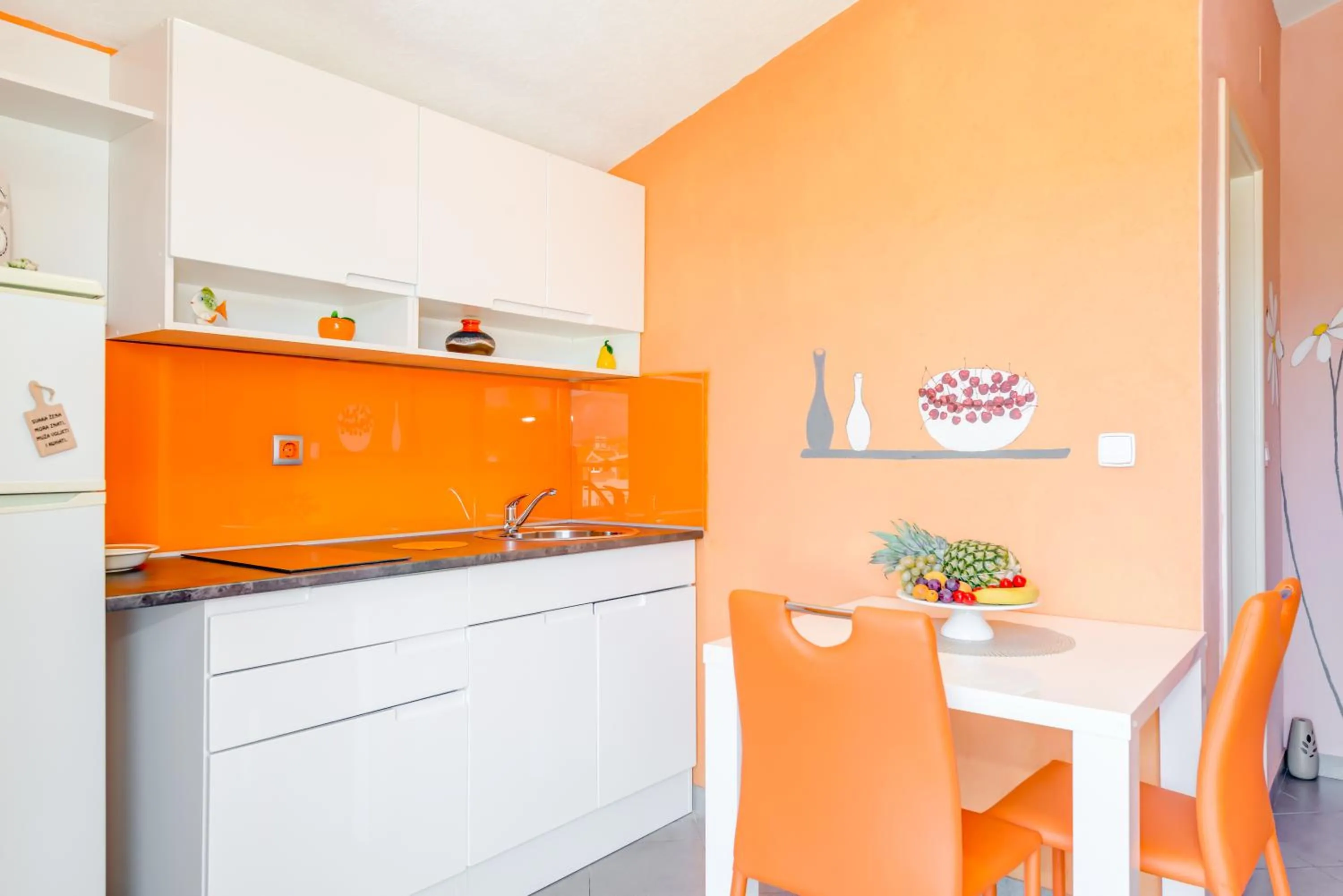 Kitchen or kitchenette in Apartments Petra