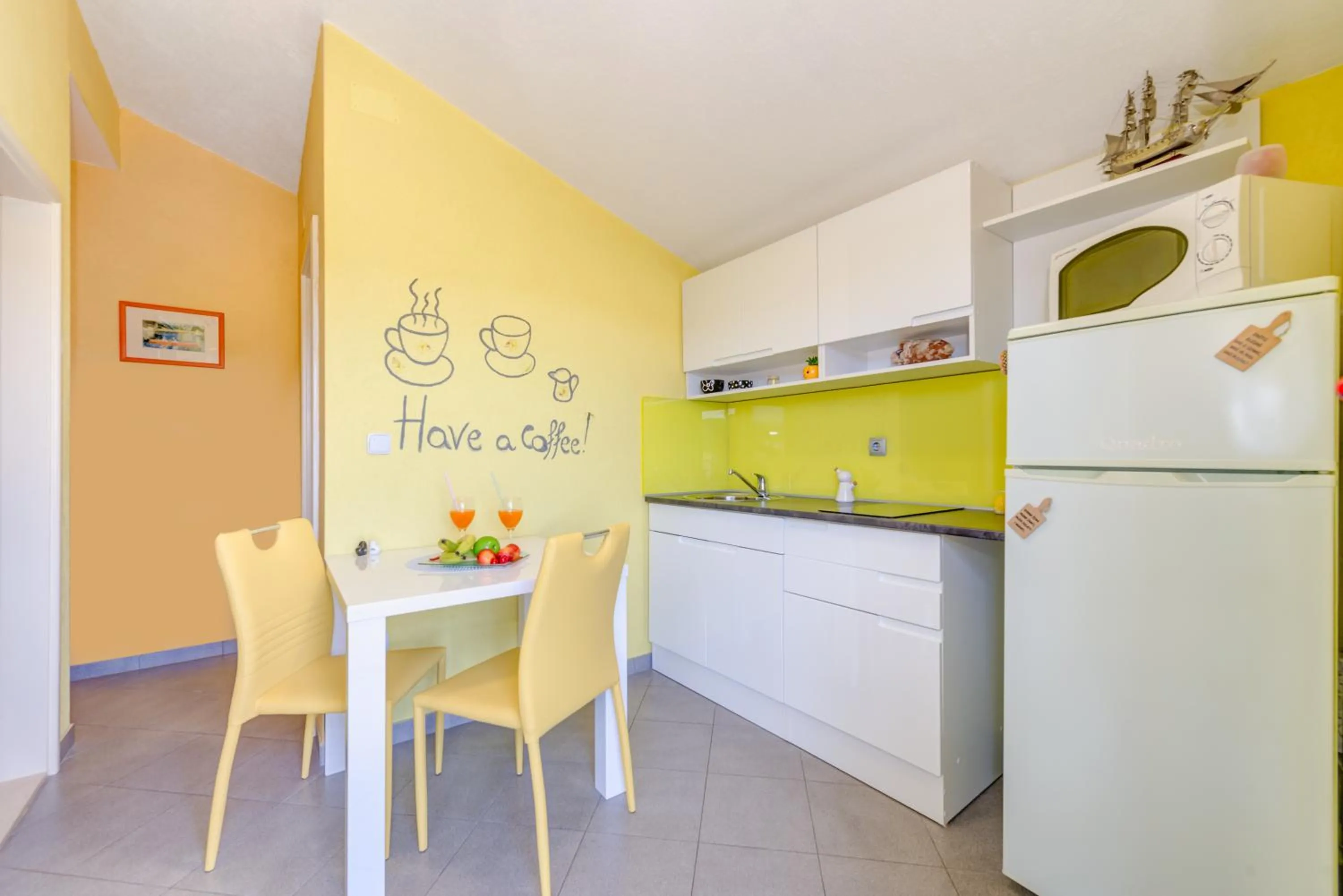 Kitchen or kitchenette in Apartments Petra