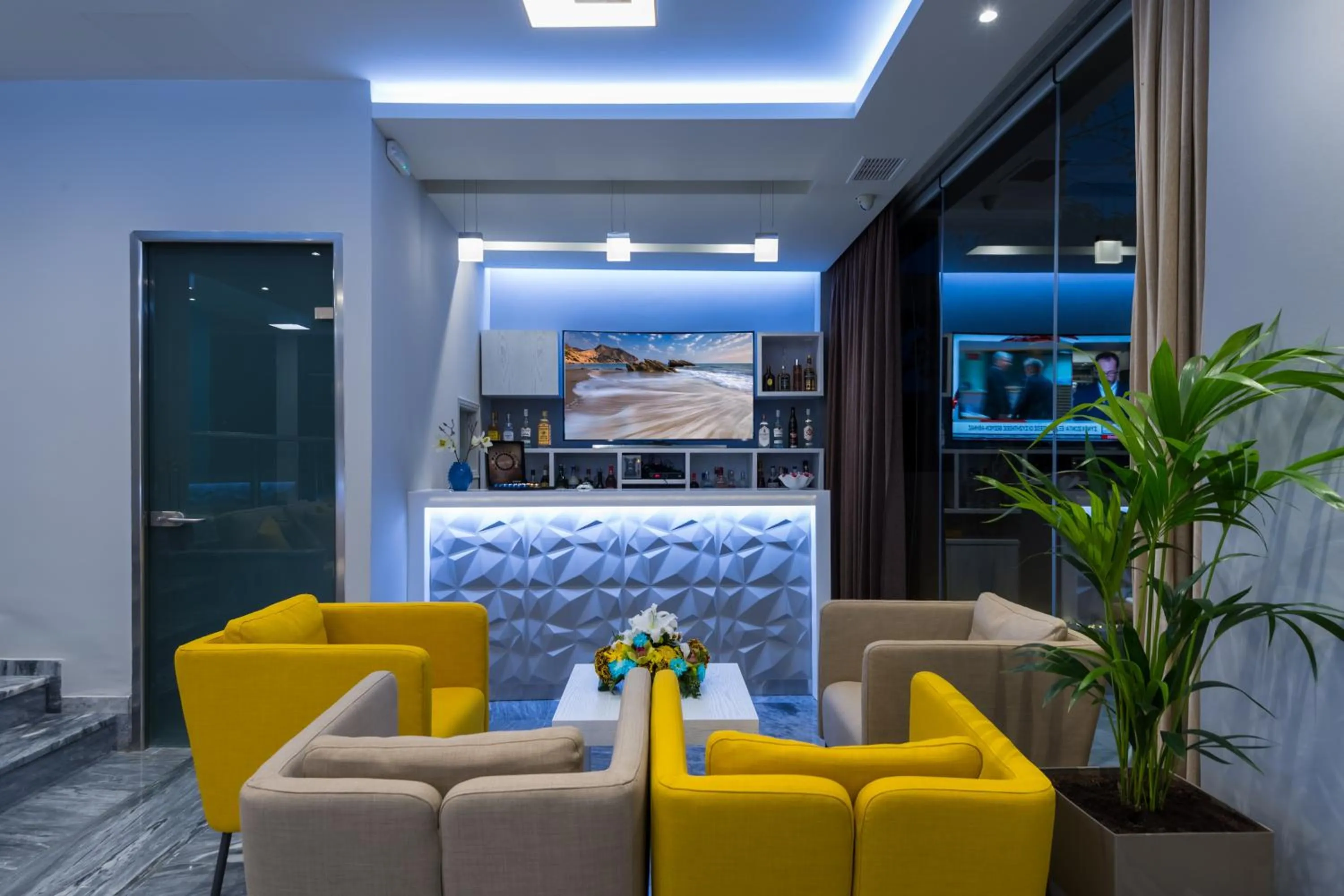 Communal lounge/ TV room in Olympia Hotel