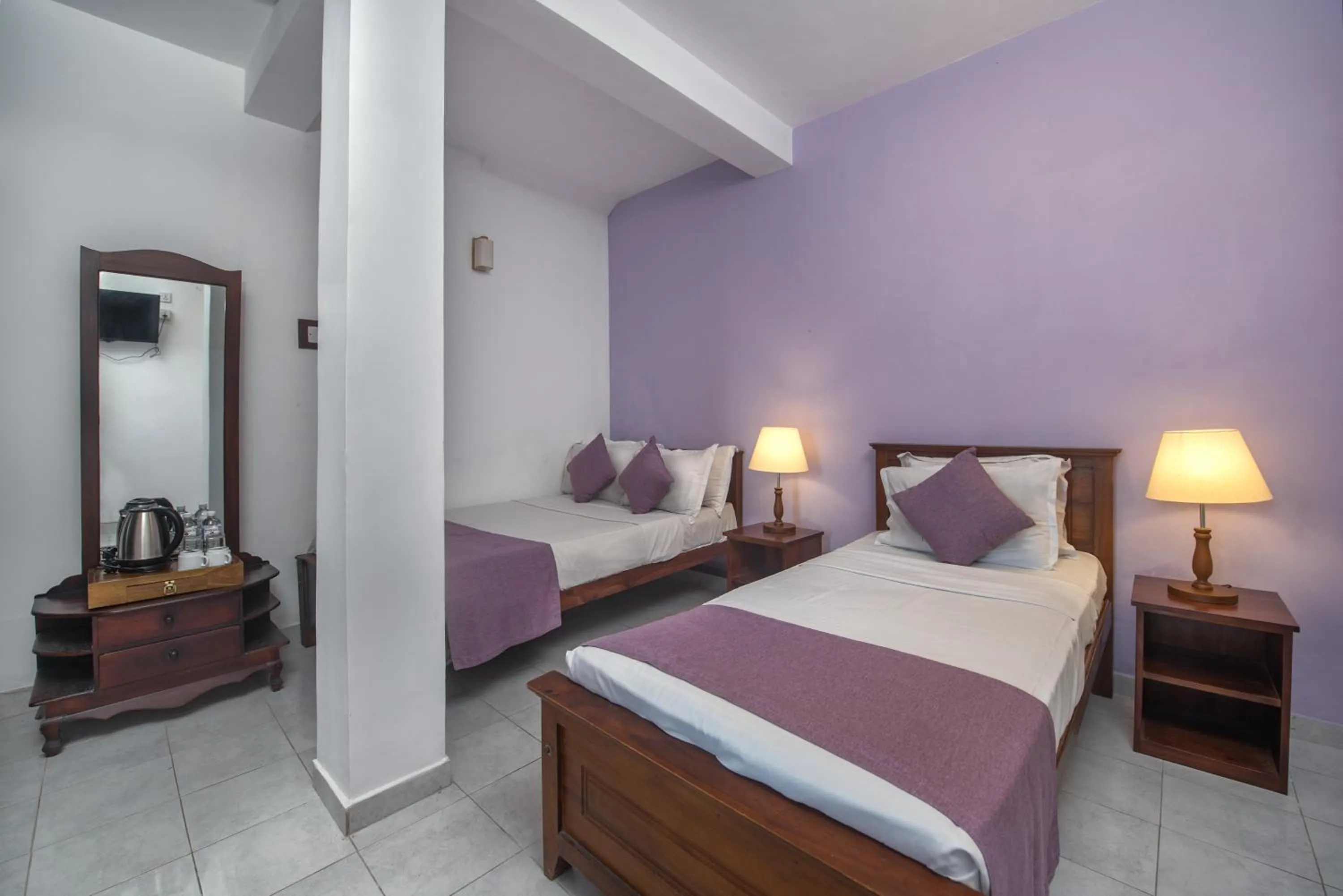 Bed in Ceyloni Lake Residency