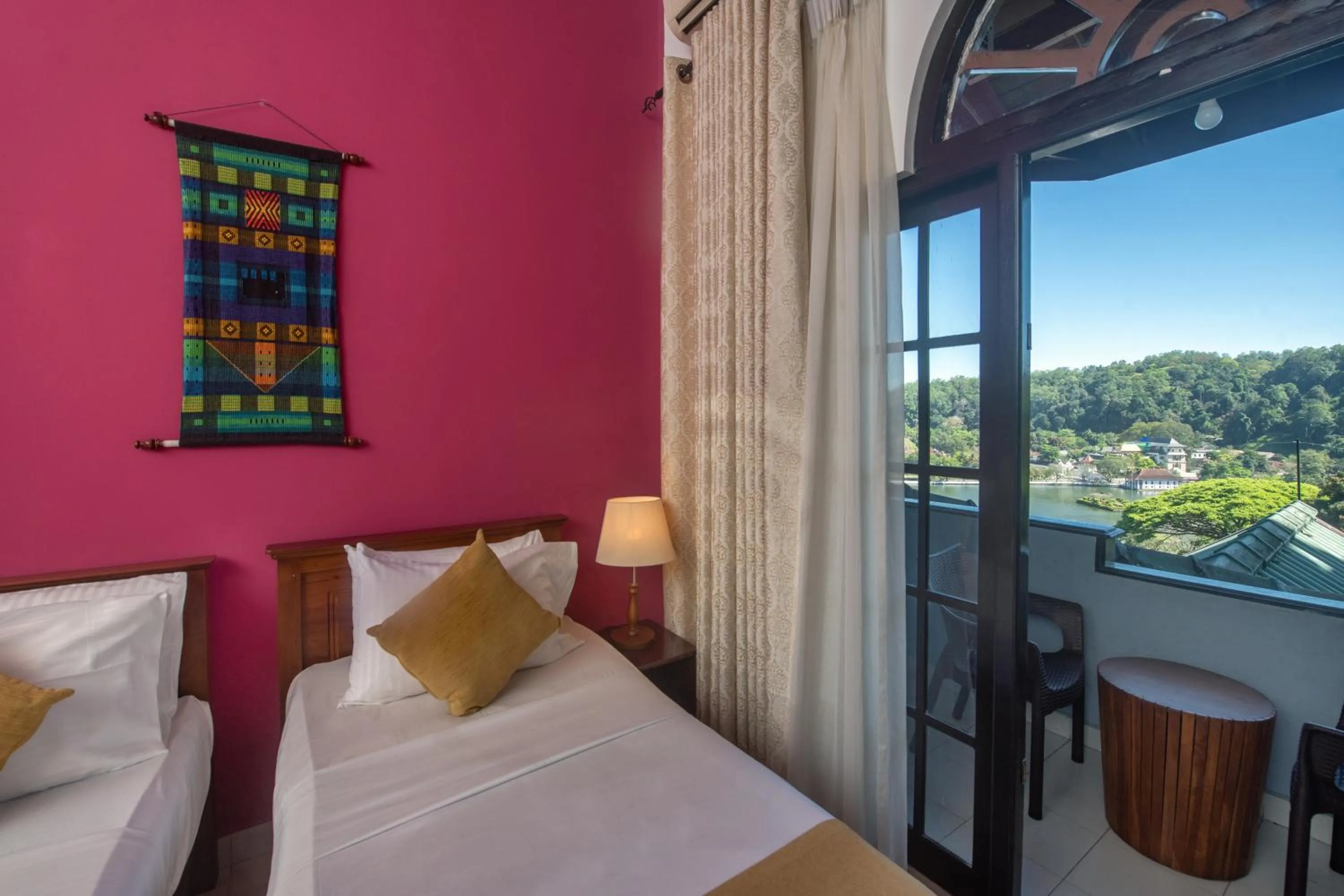 Bed in Ceyloni Lake Residency