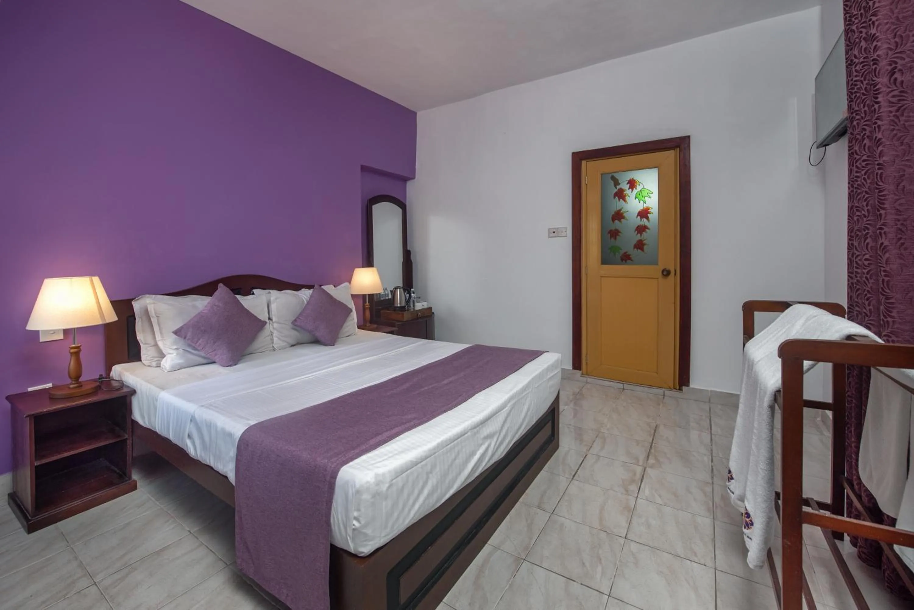 Bed in Ceyloni Lake Residency