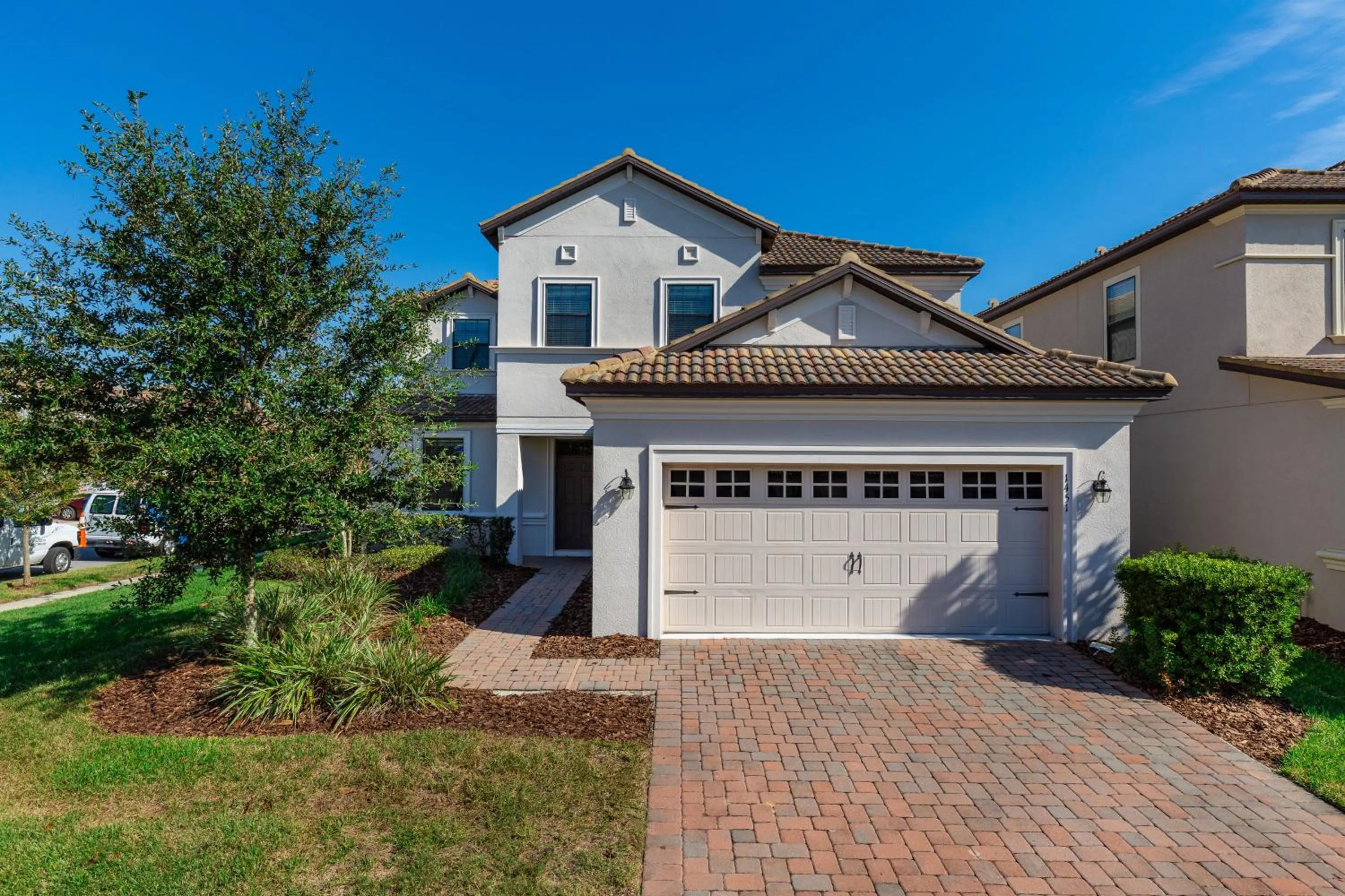 Property building in Moonlight Ridge - 5 bed ChampionsGate Resort pool home