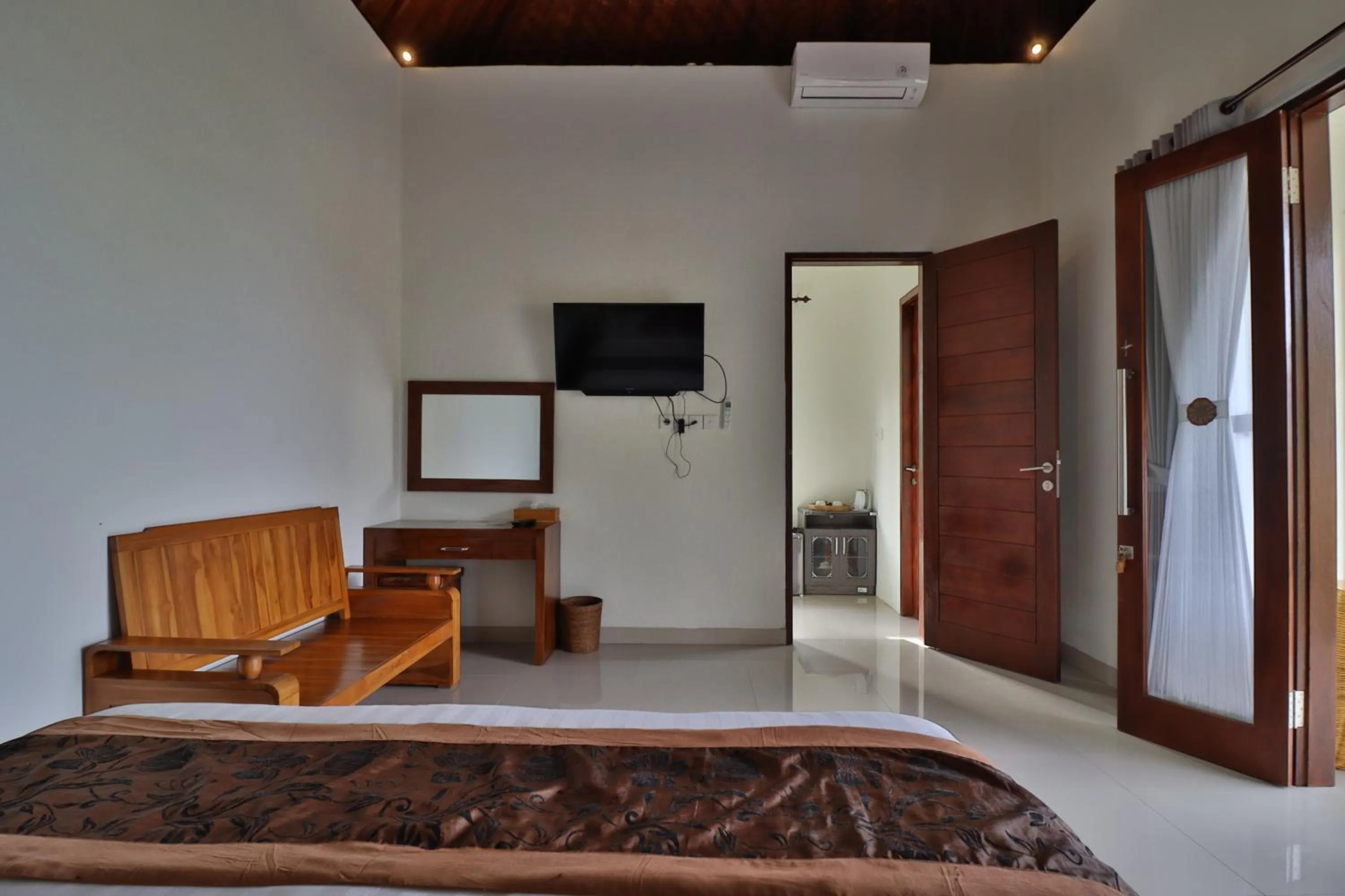 Bed in Arya Resort Nusa Penida