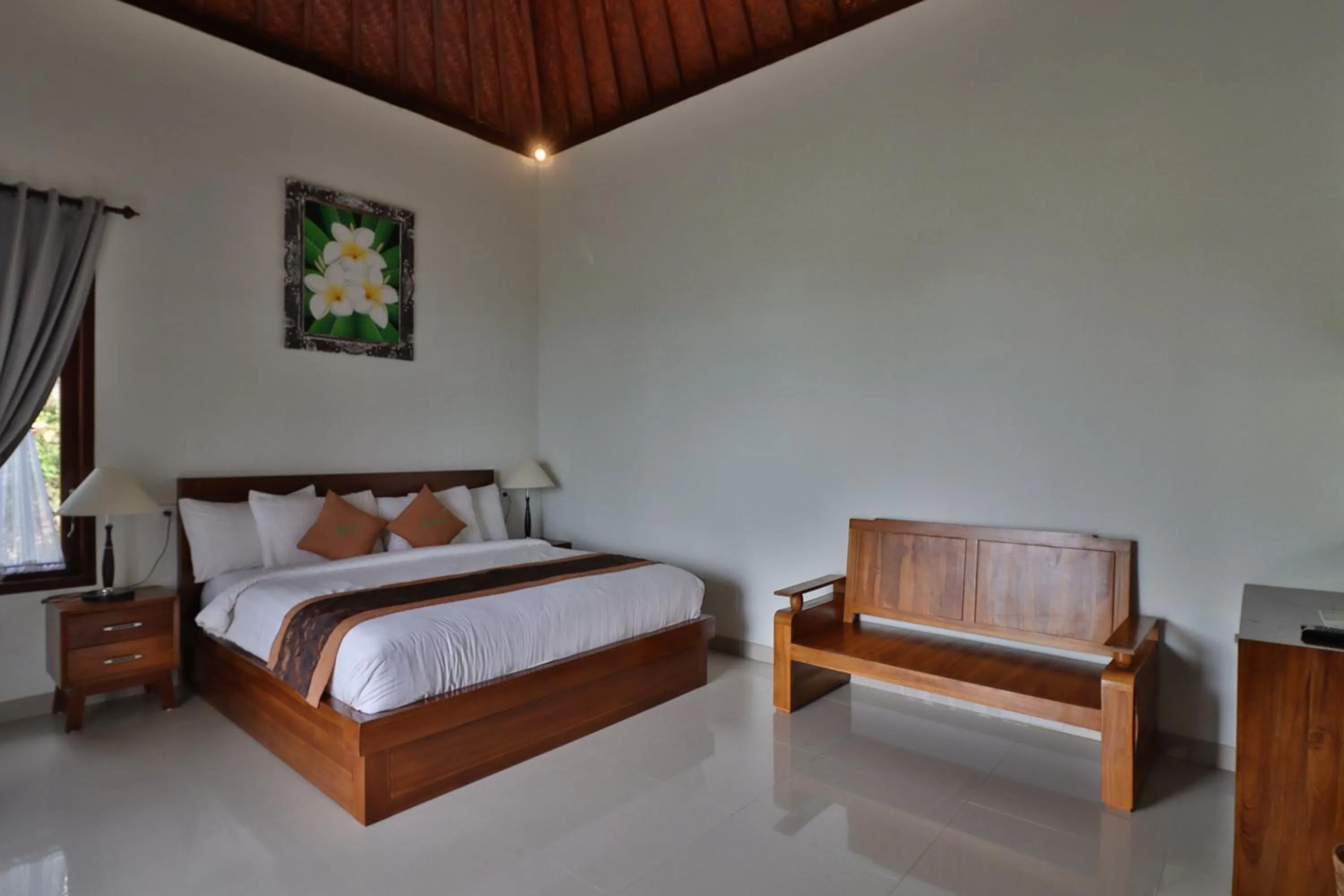 Bed in Arya Resort Nusa Penida