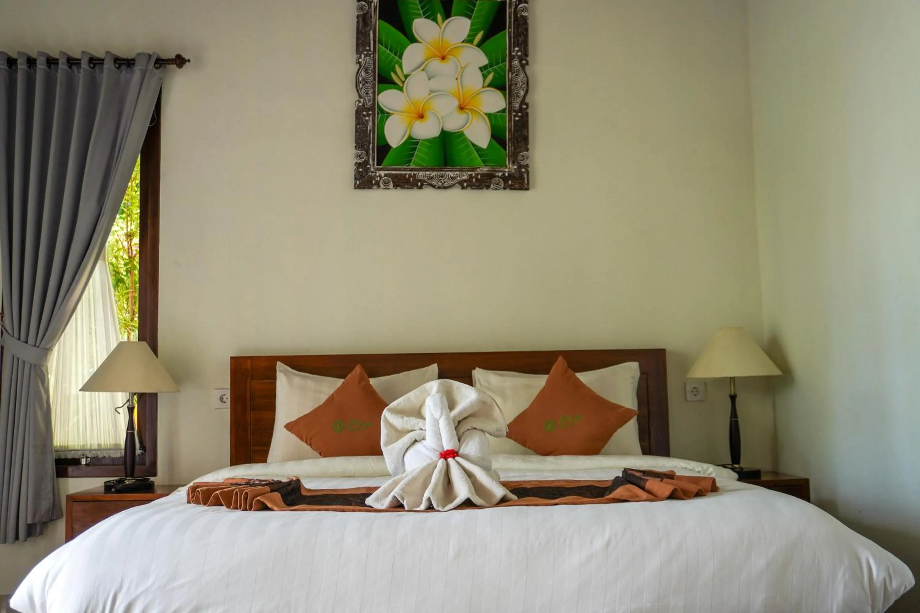 Bed in Arya Resort Nusa Penida