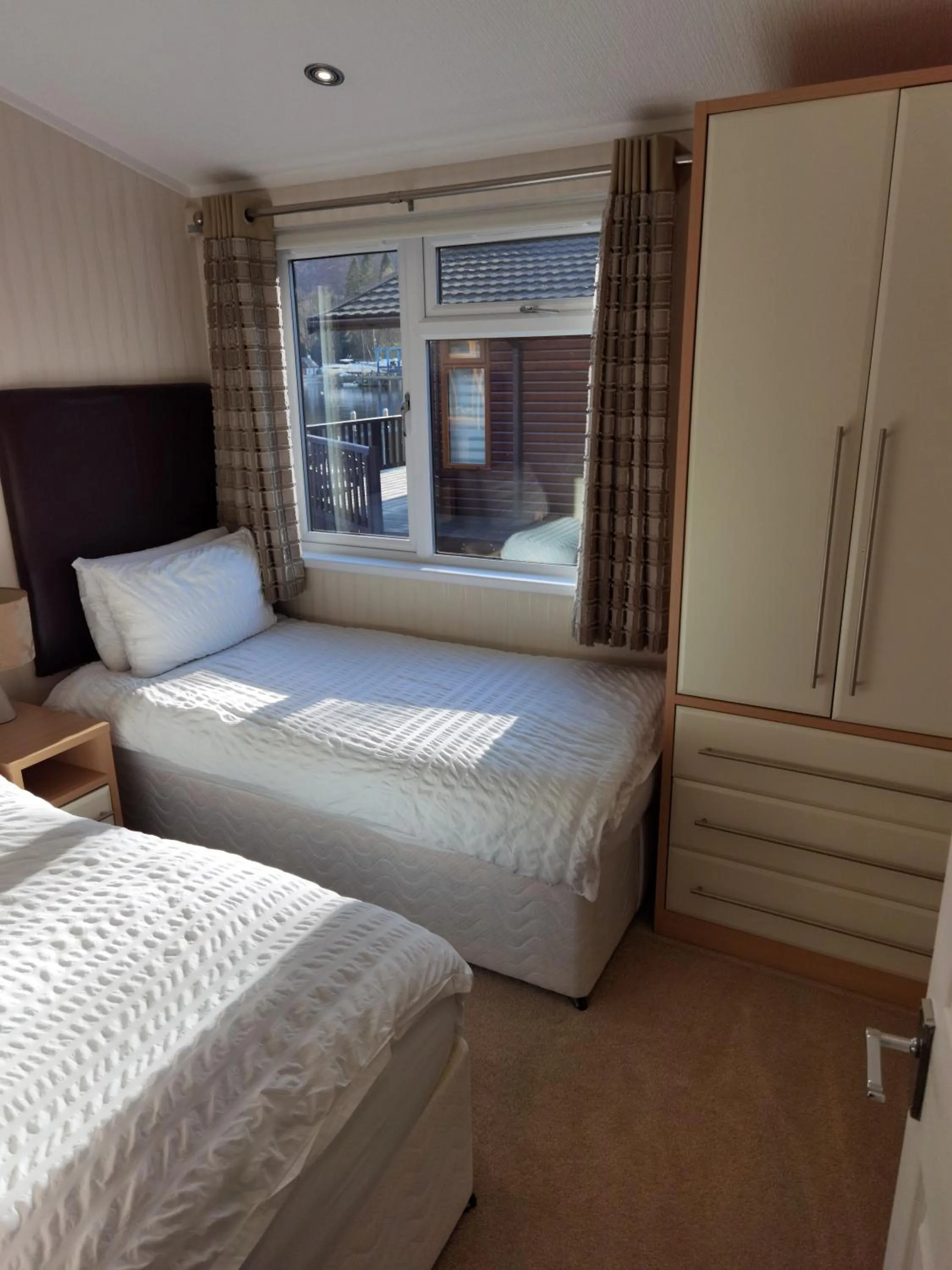 Bed in Bonnie Banks Lodge Ardlui